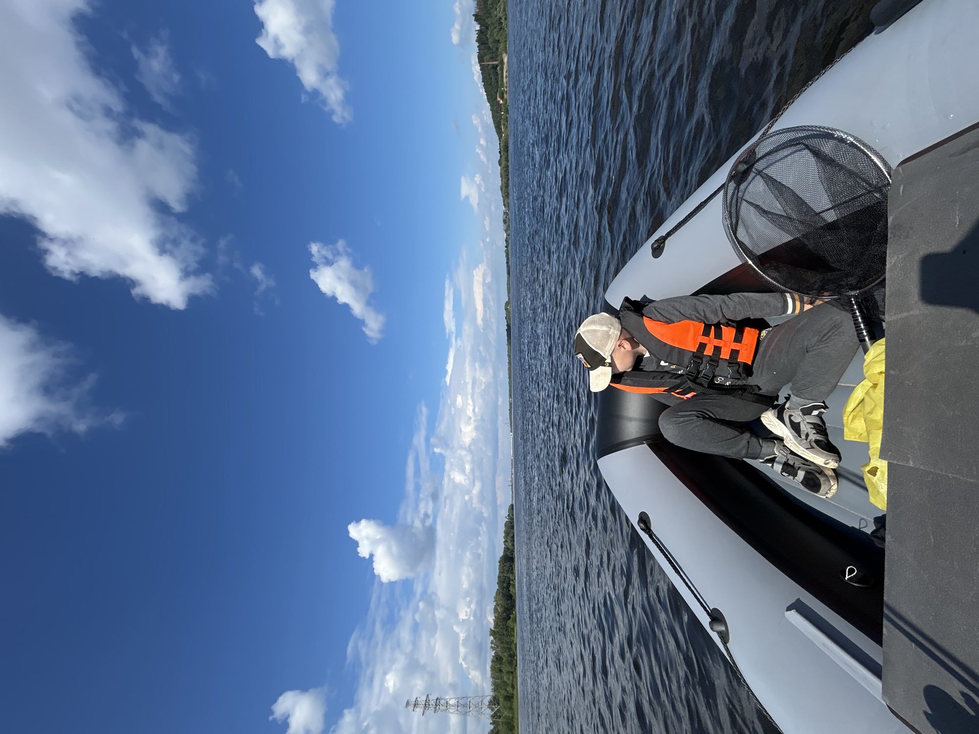 River fishing near Chaykovsky with big sky and forest backdrop