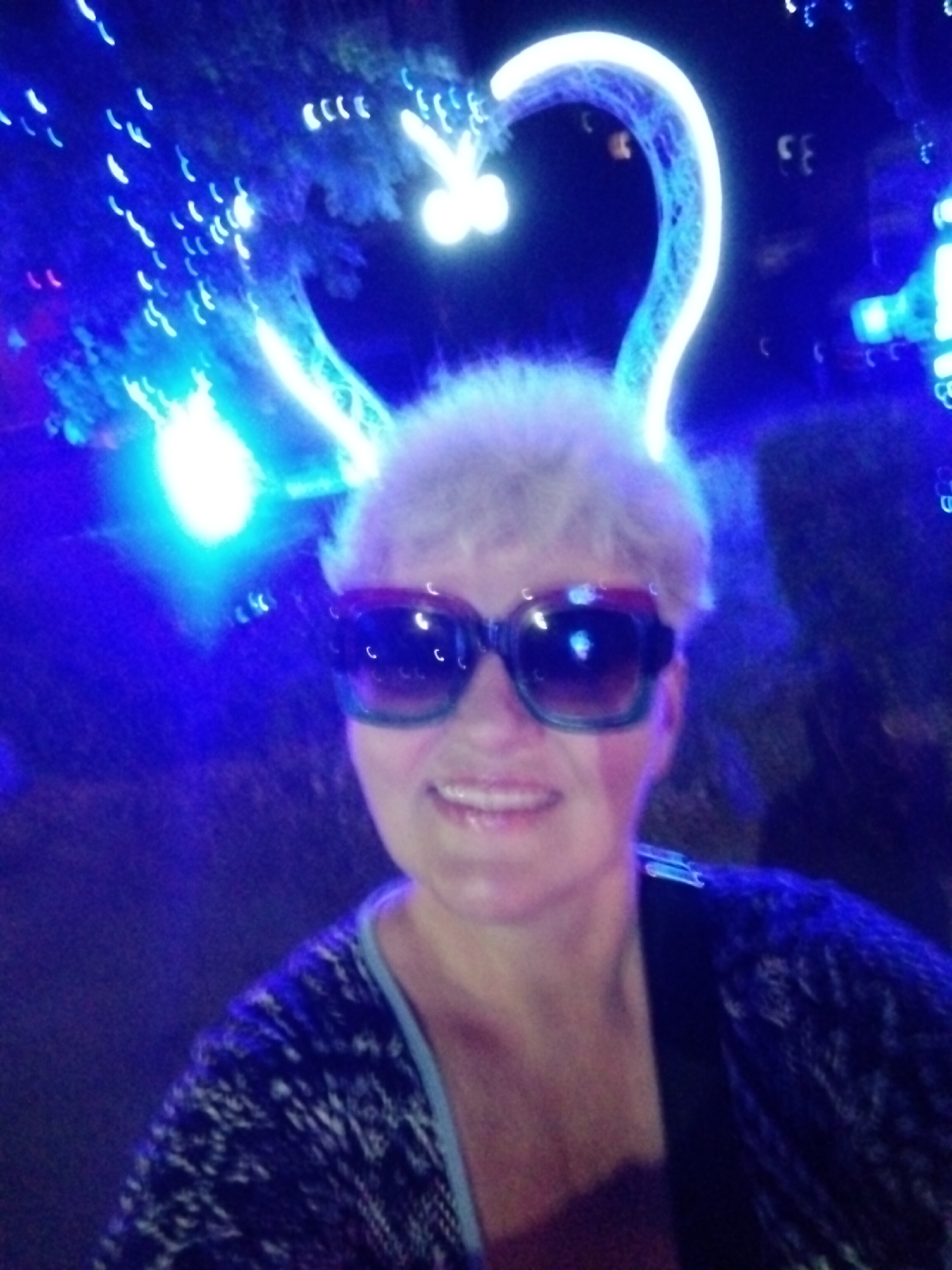 Woman, dog visit illuminated rabbit sculptures in Ukrainian city