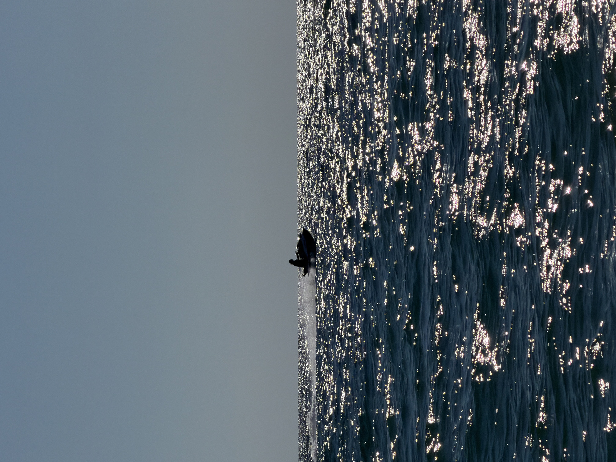 Jet skis, boats, and beach life on Sochi's Black Sea coast.