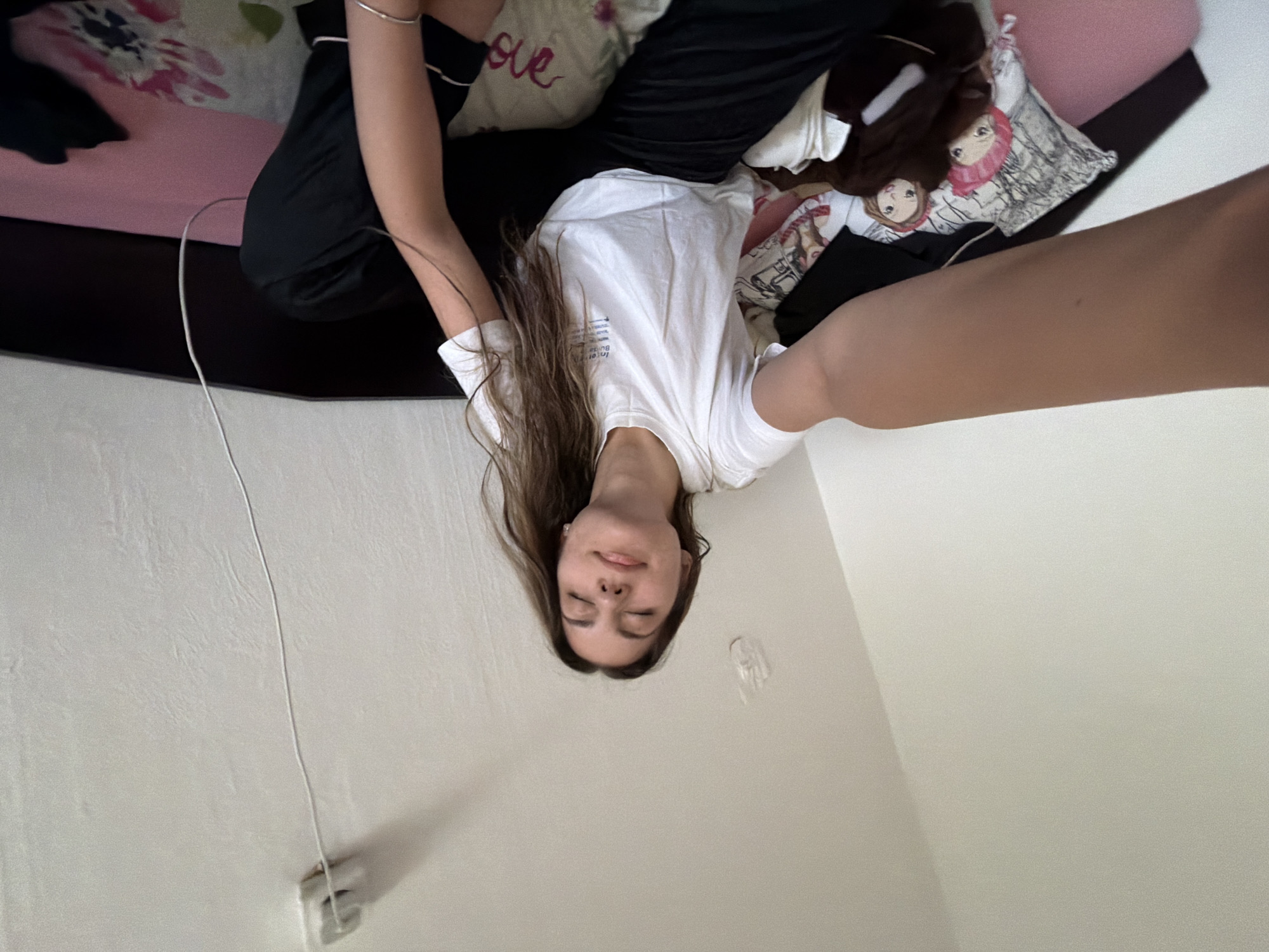Woman rests in Sofia bedroom during quiet afternoon