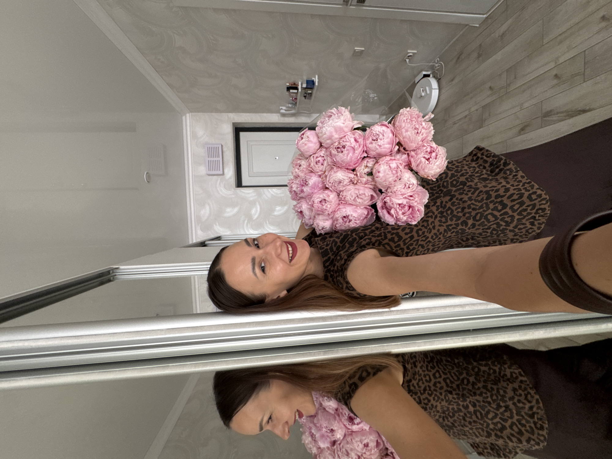 Woman and child share peony bouquet moments in Sochi