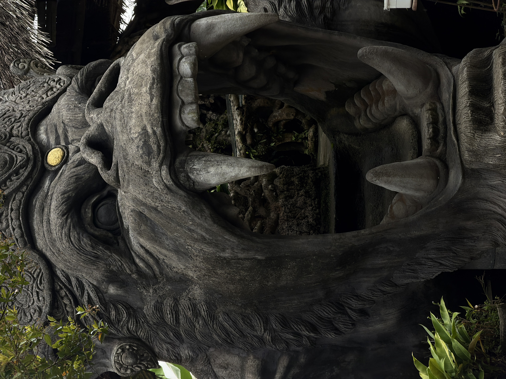 Tourist documents temple grounds and Gorilla Cafe in Tembuku