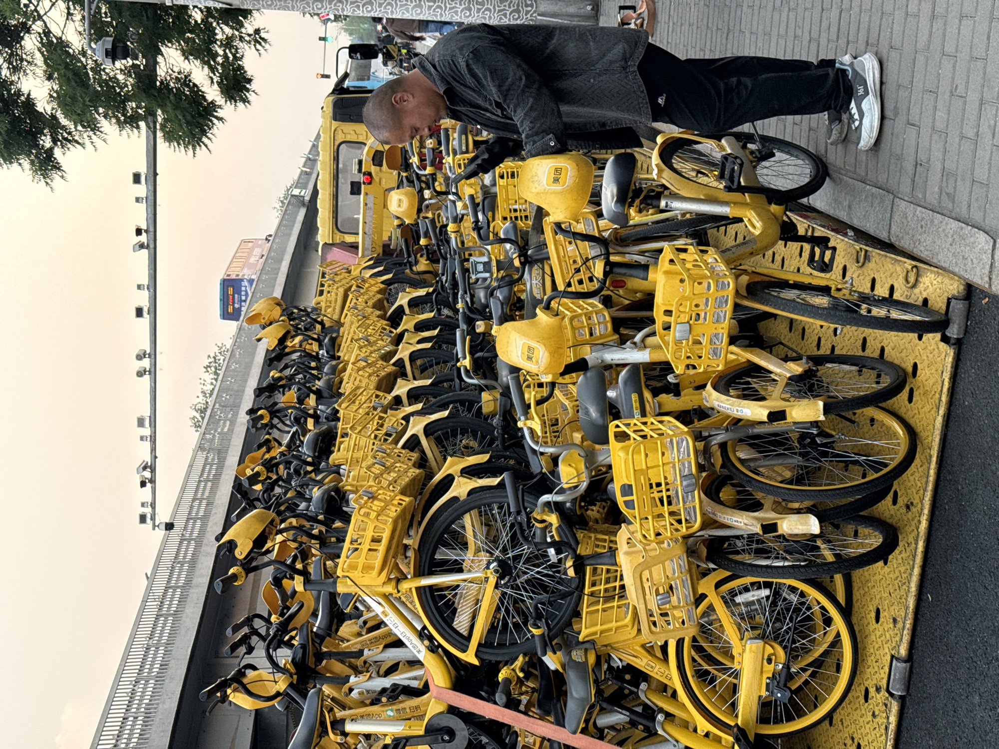 Bike-sharing maintenance operations observed in Beijing's Dongcheng District