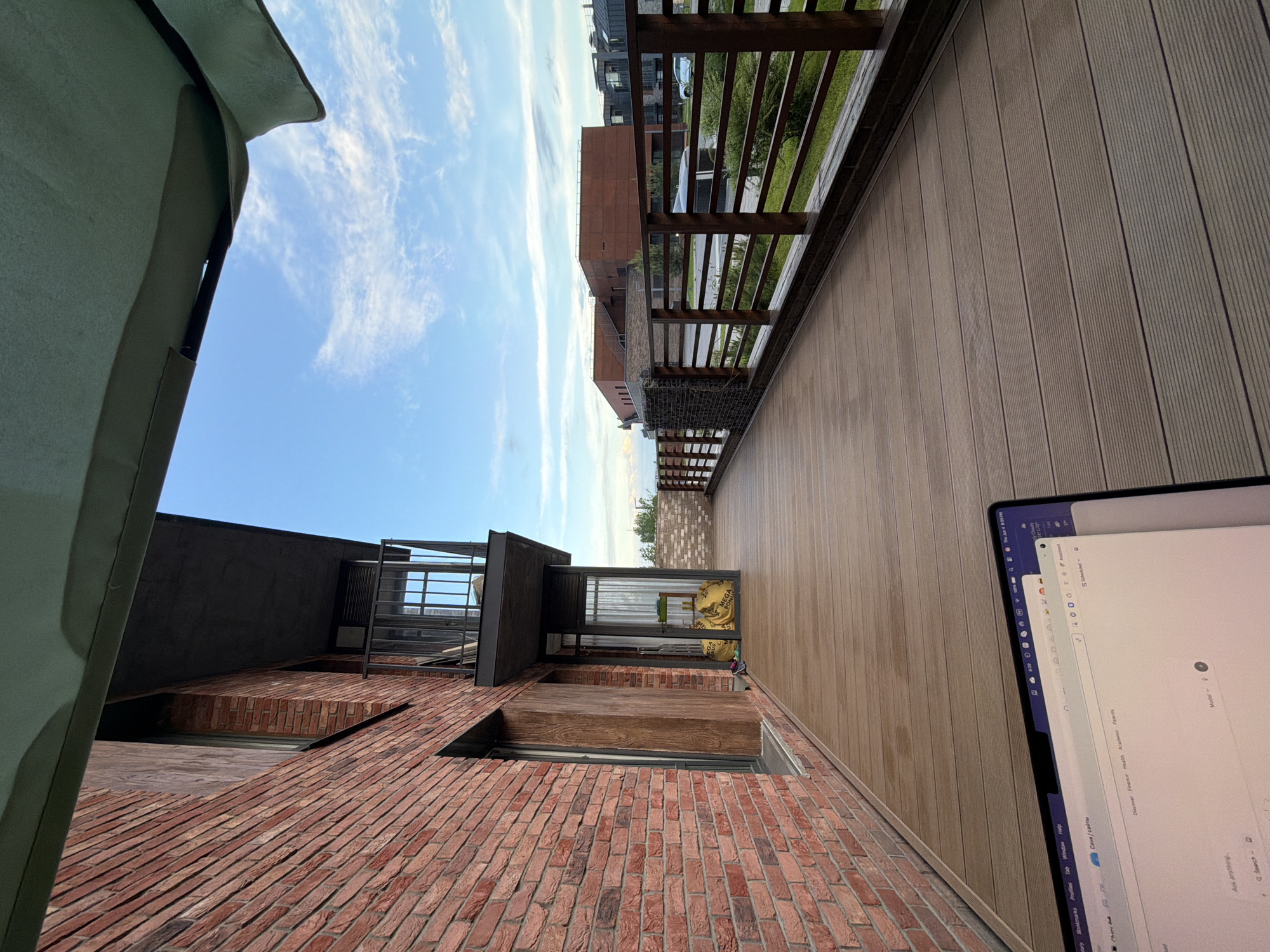 Elevated view captures green fabric structure in Strelna afternoon