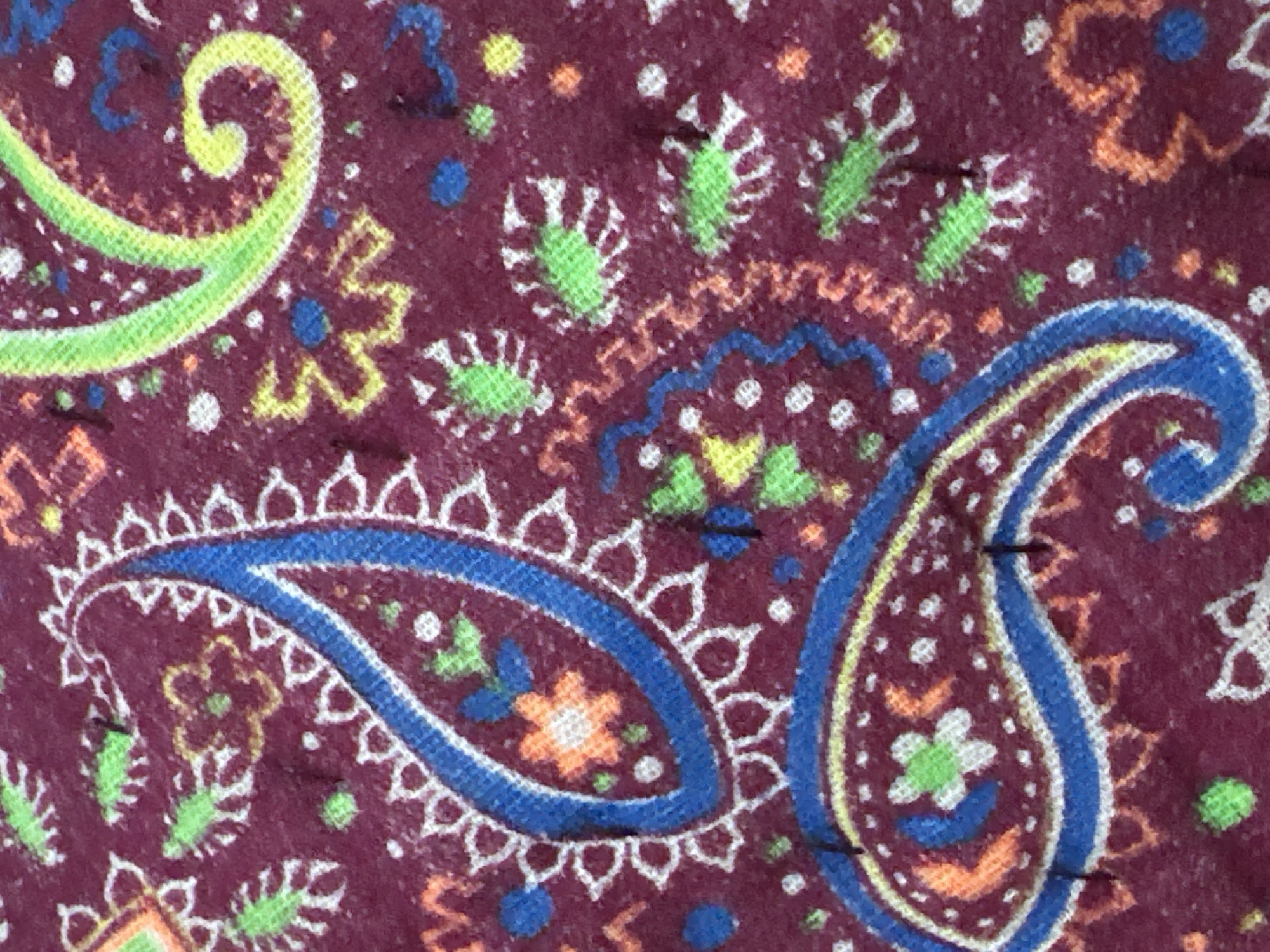 Fabrics, charms, and small objects laid out in Tashkent