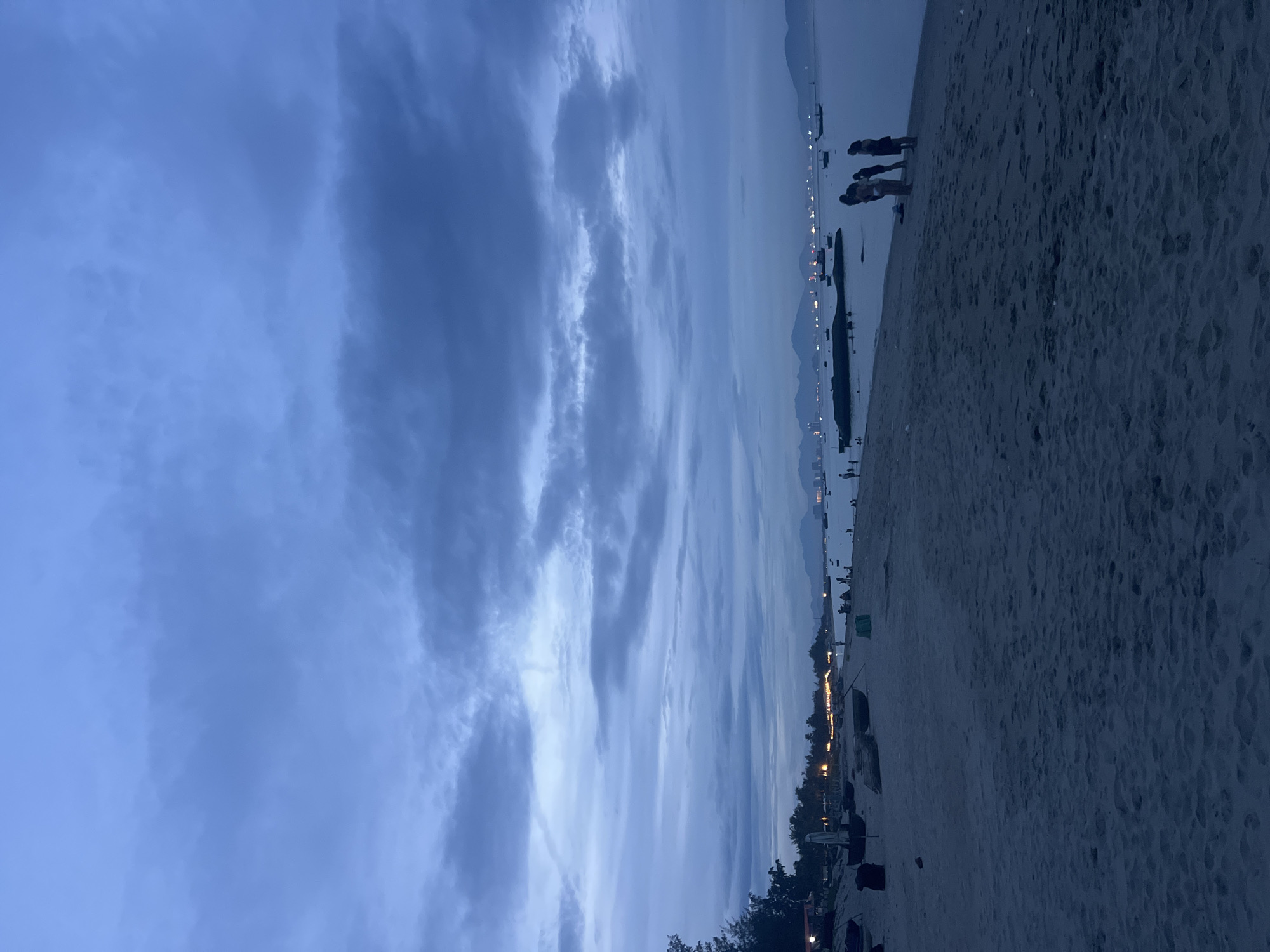 Hoi An beach at dusk: bonfires, empty sands, abandoned resort