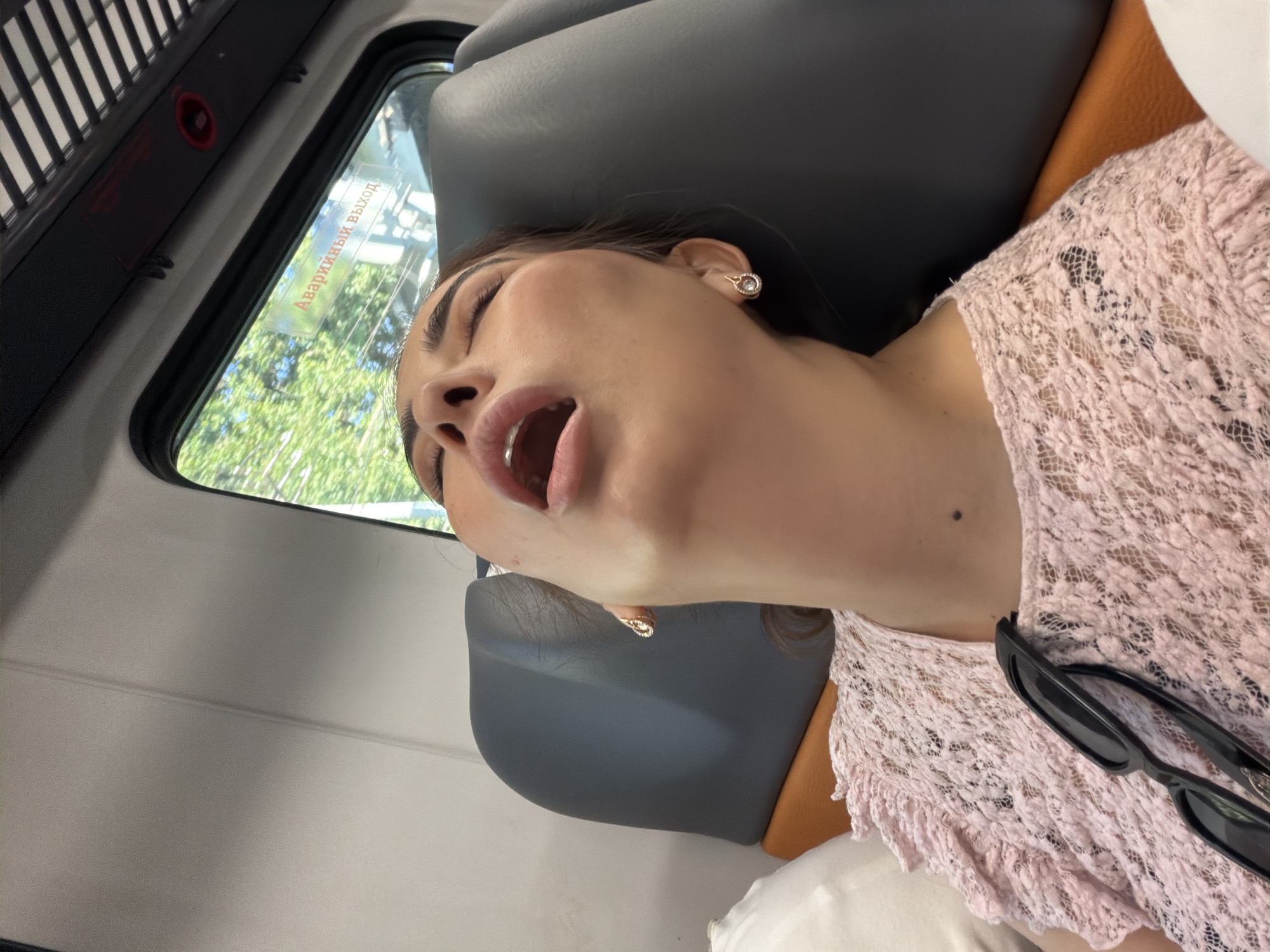 Commuters in transit: phones, naps, and a busy escalator hub