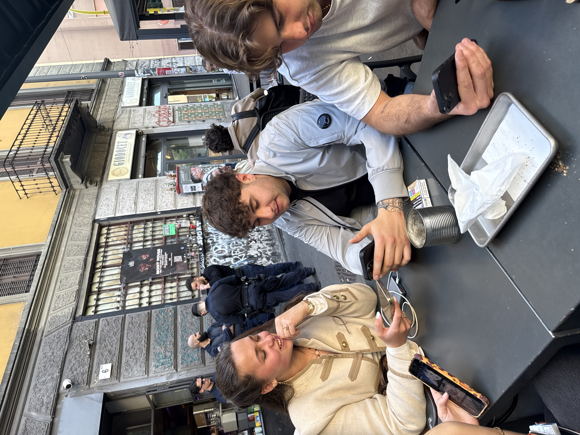 Cafe gathering with smartphones observed in Milan