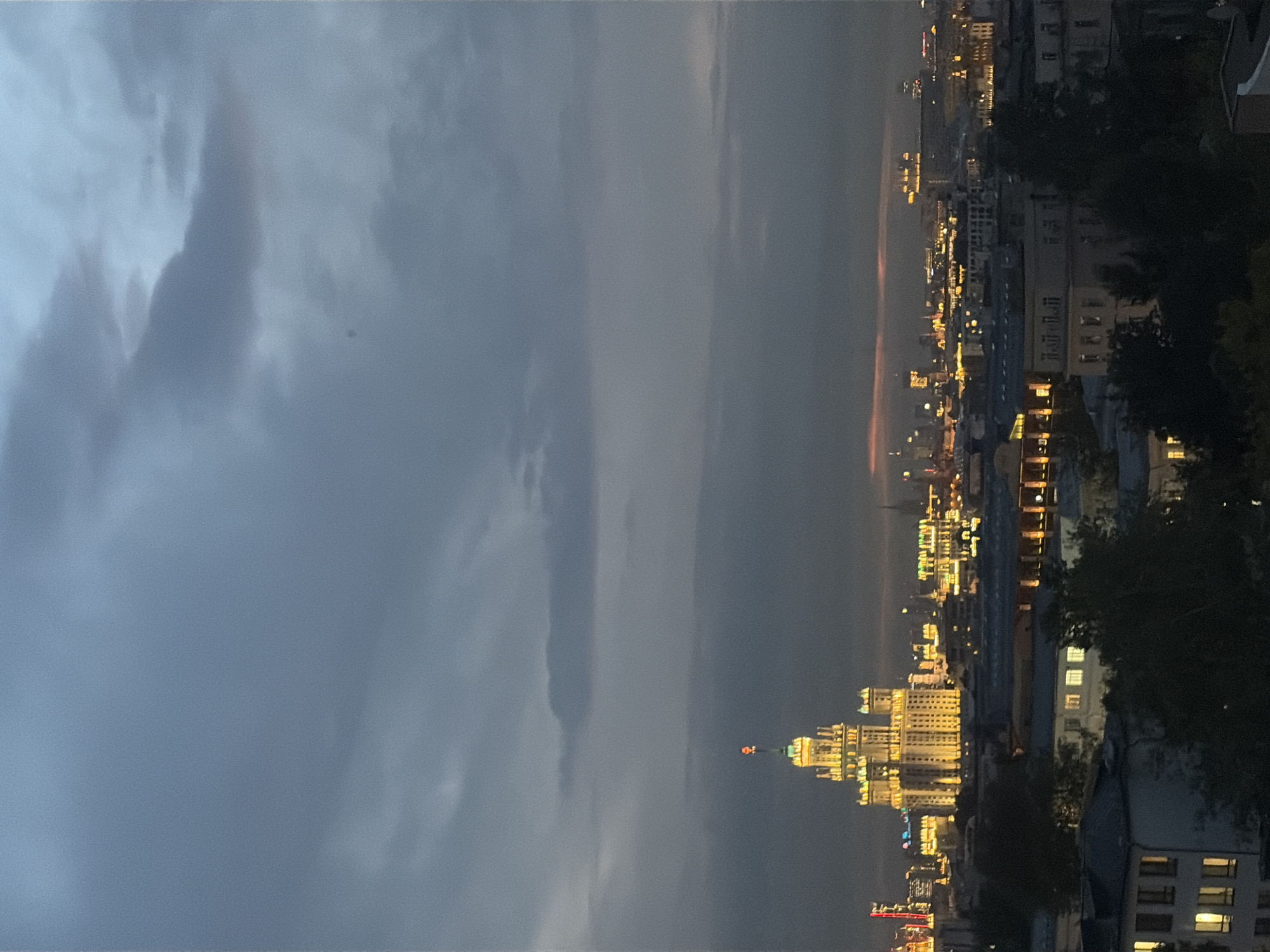 Moscow skyline transitions from dusk to night, July 2026