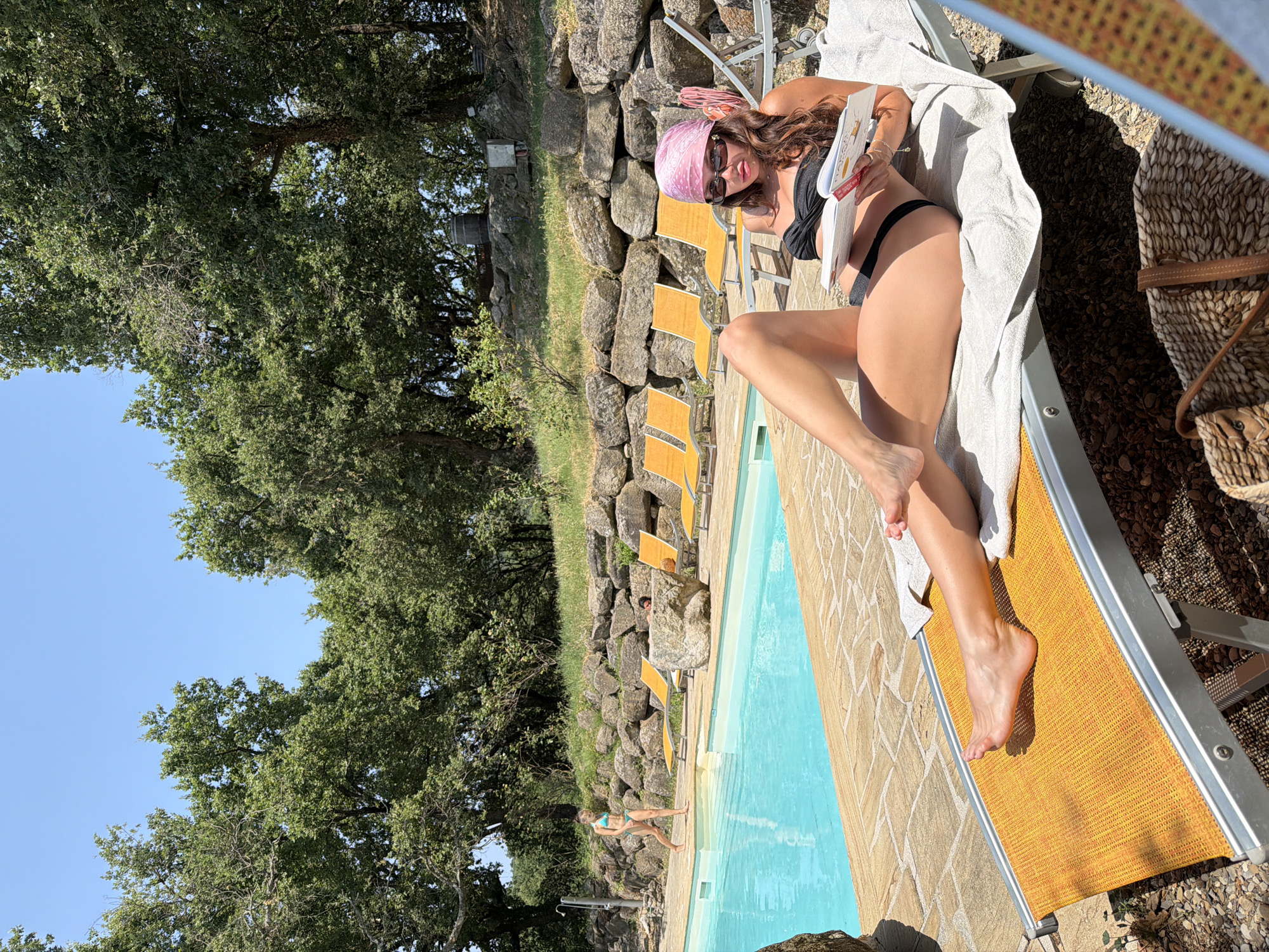 Lazy poolside morning at a Tuscan countryside retreat