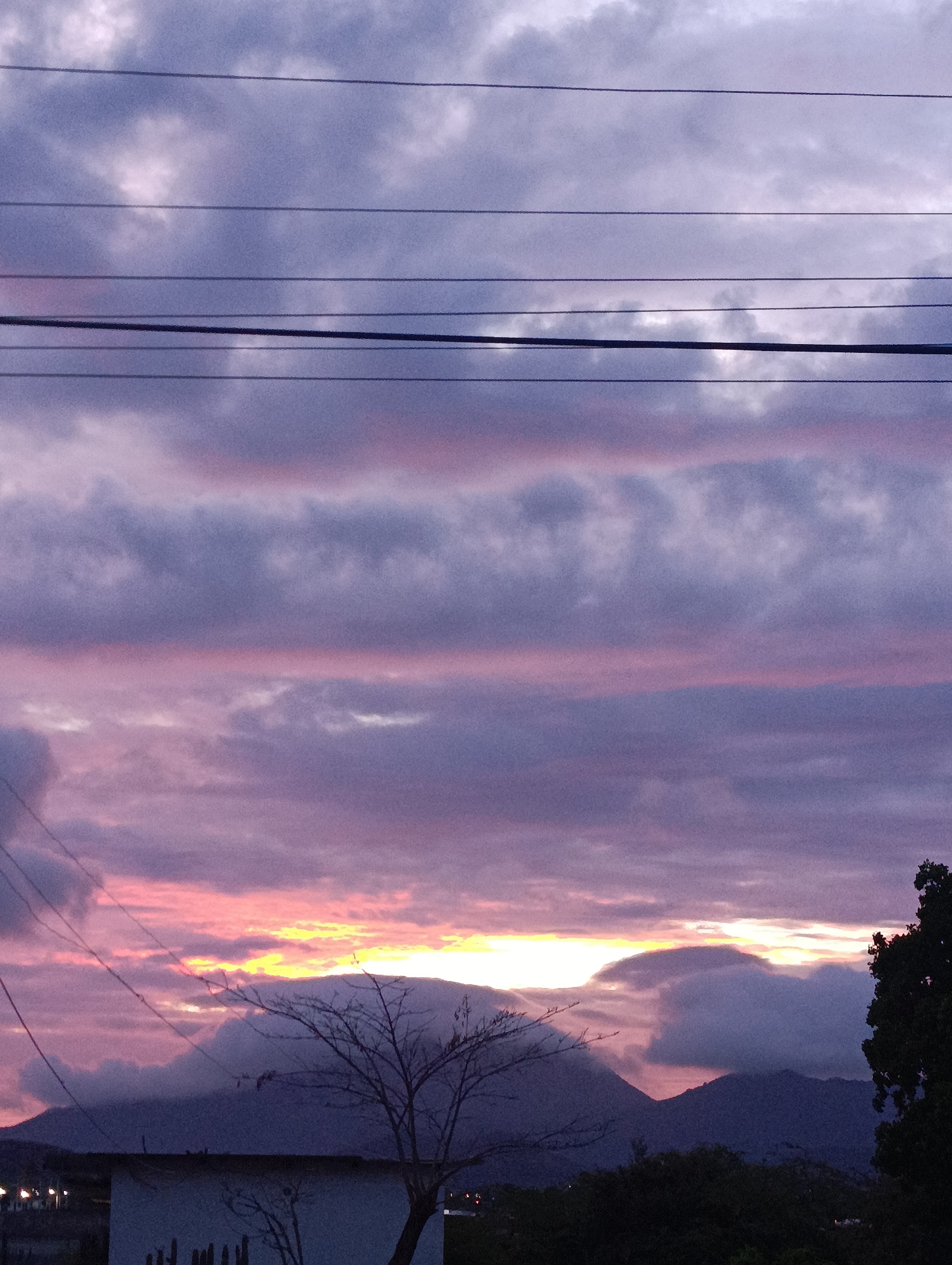 Dramatic sunset observed over Juan Griego fishing harbor