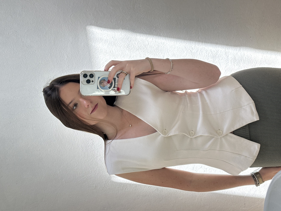 Young woman photographed in various indoor, outdoor settings