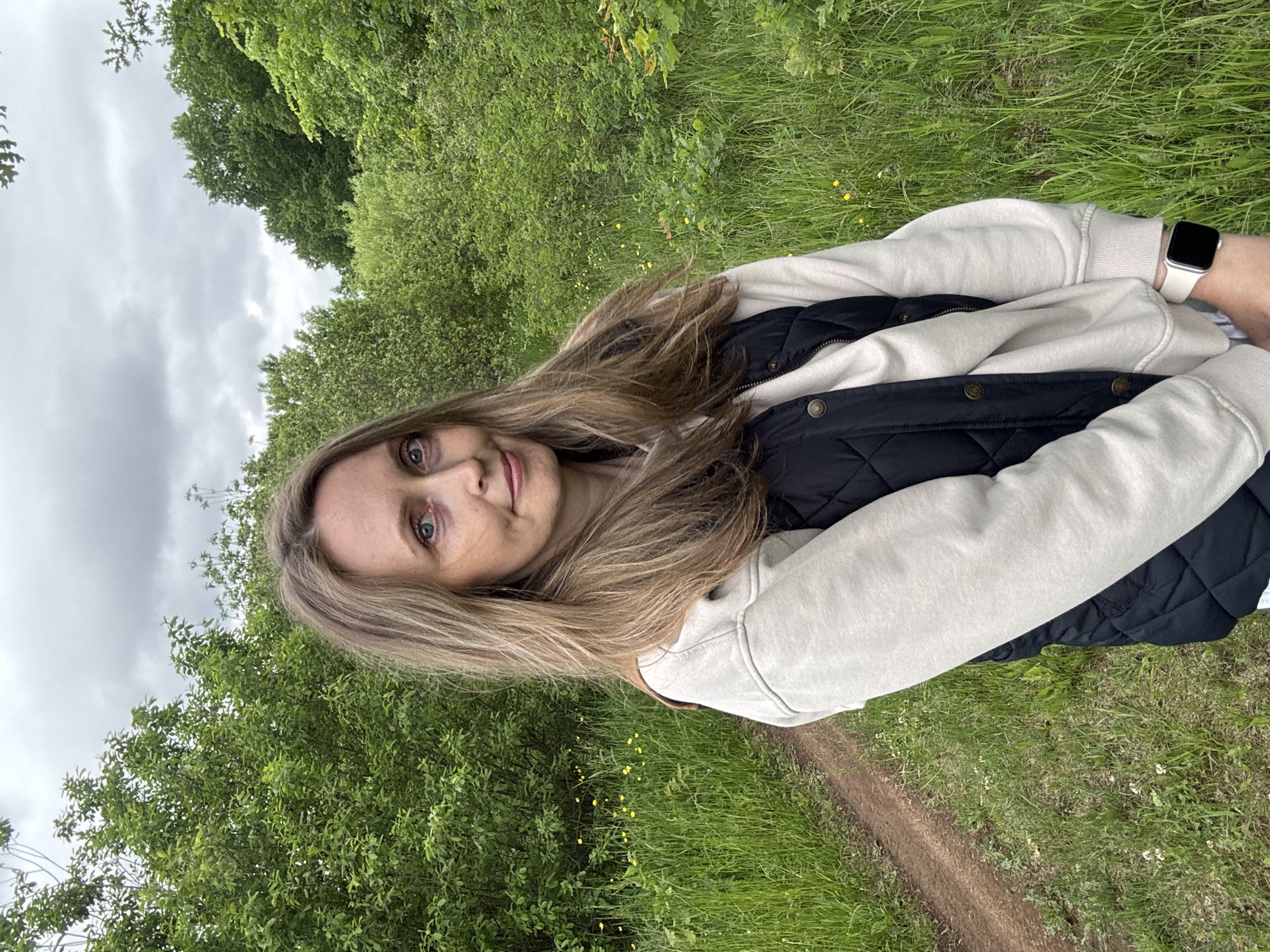 Woman photographed on nature path in Noviy, Russia