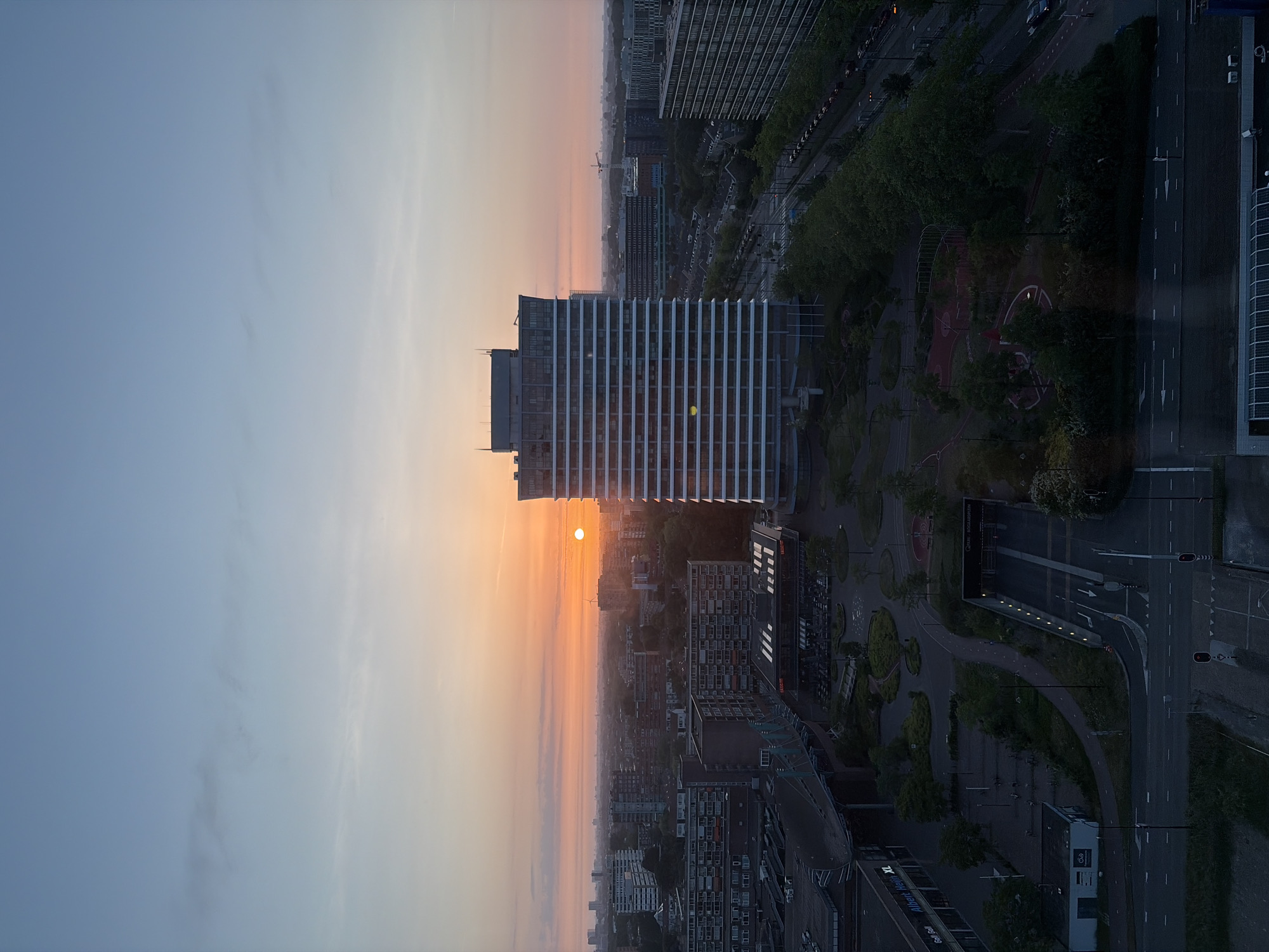 Dawn photography and Russian text displays documented in Rijswijk