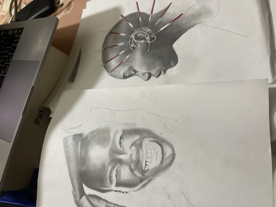 Artist creates portrait drawings in evening session in Jos