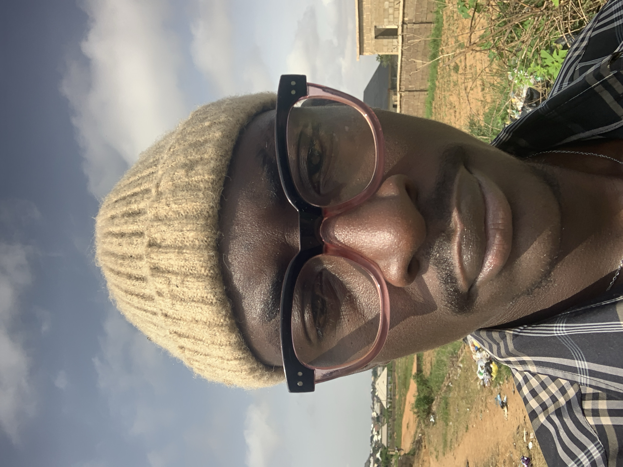 Selfies and street scenes from a rocky, semi-rural Jos morning