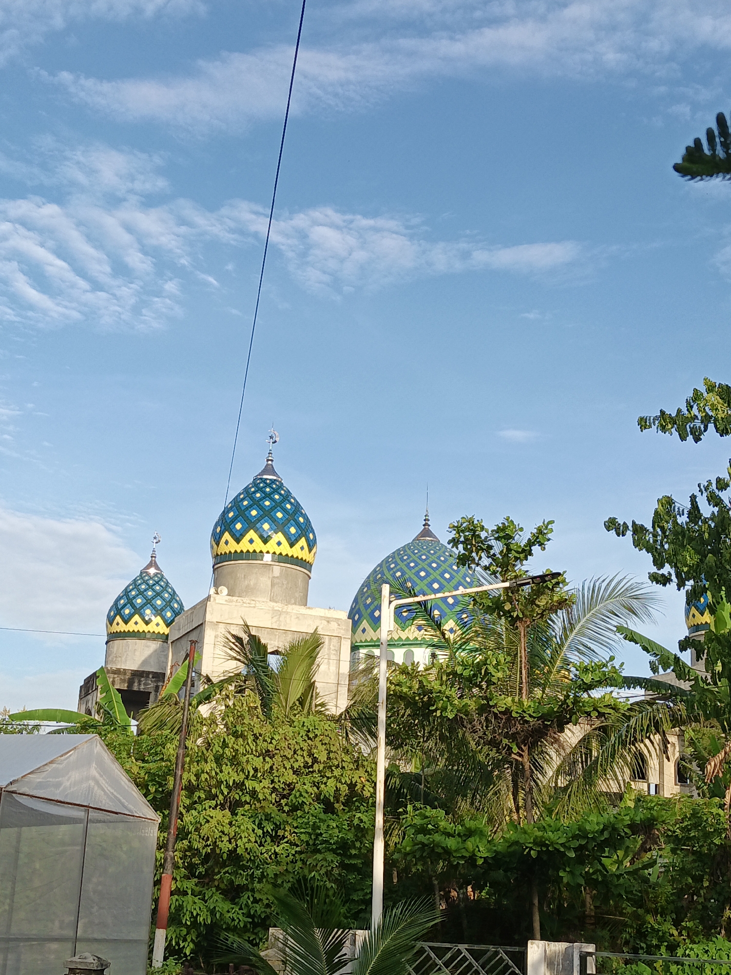 Morning scenes documented across Lhokseumawe, Indonesia neighborhoods