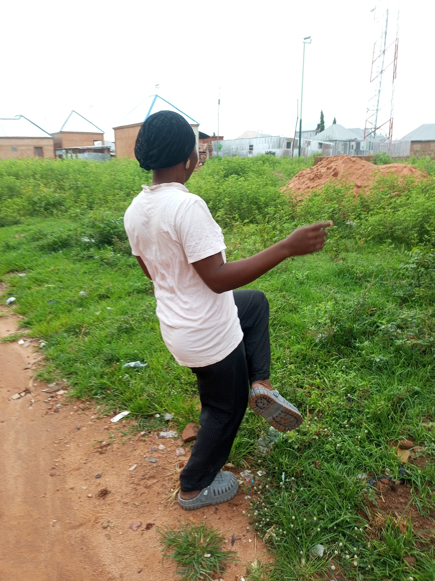 Morning routines on the dirt paths of Tempure, Nigeria
