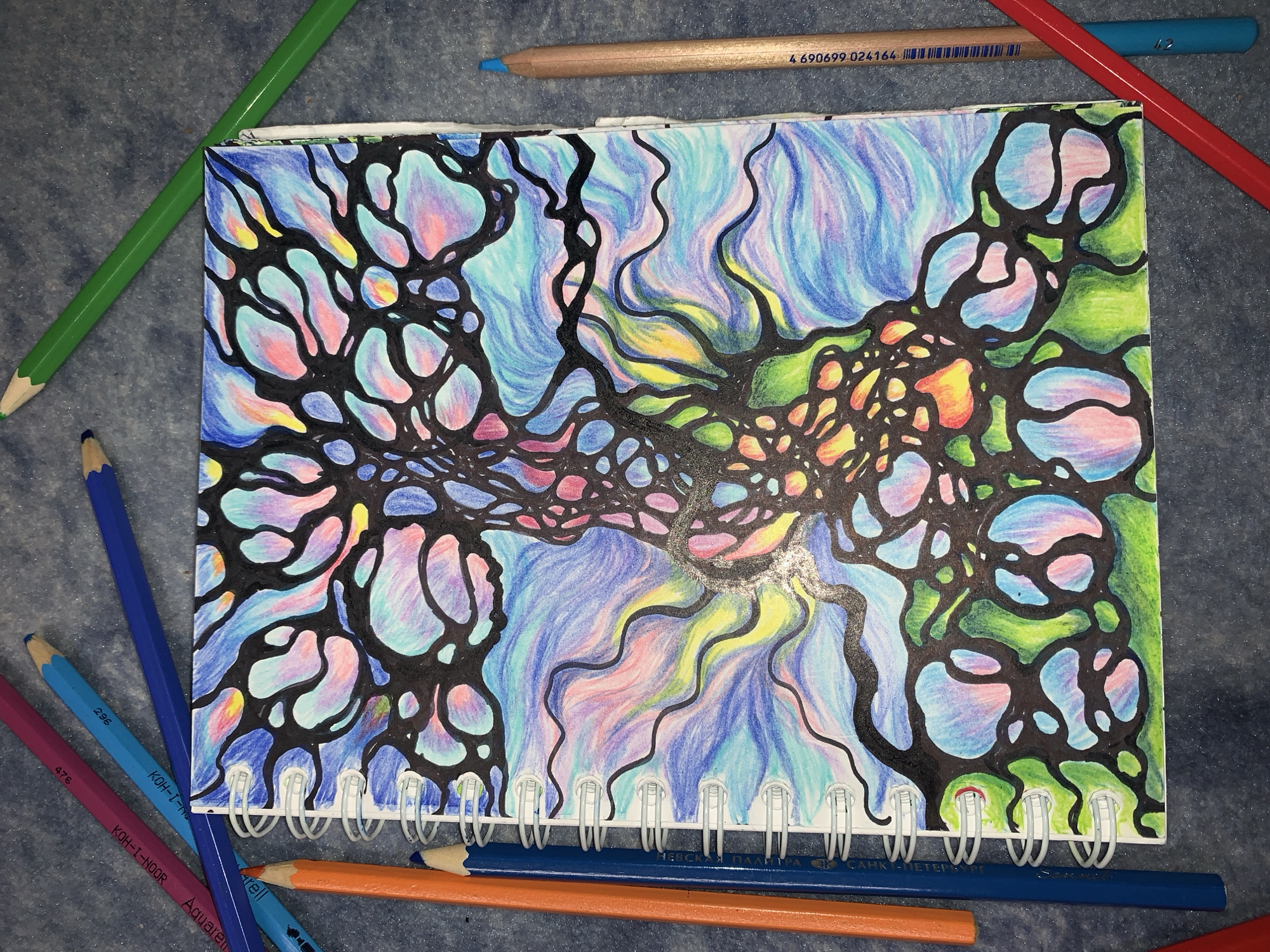 Abstract cell-pattern drawing in a colorful sketchbook