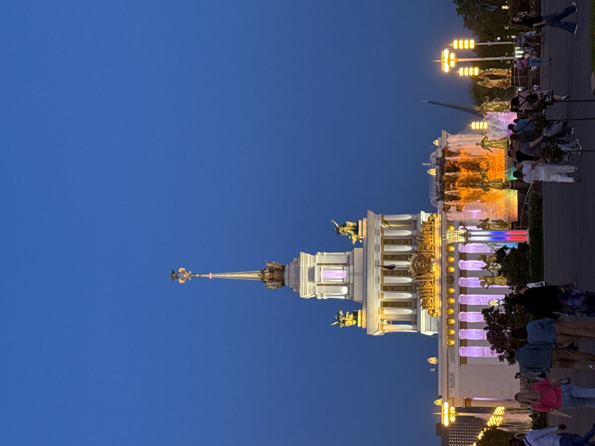 Evening scenes captured at illuminated Moscow government building and park