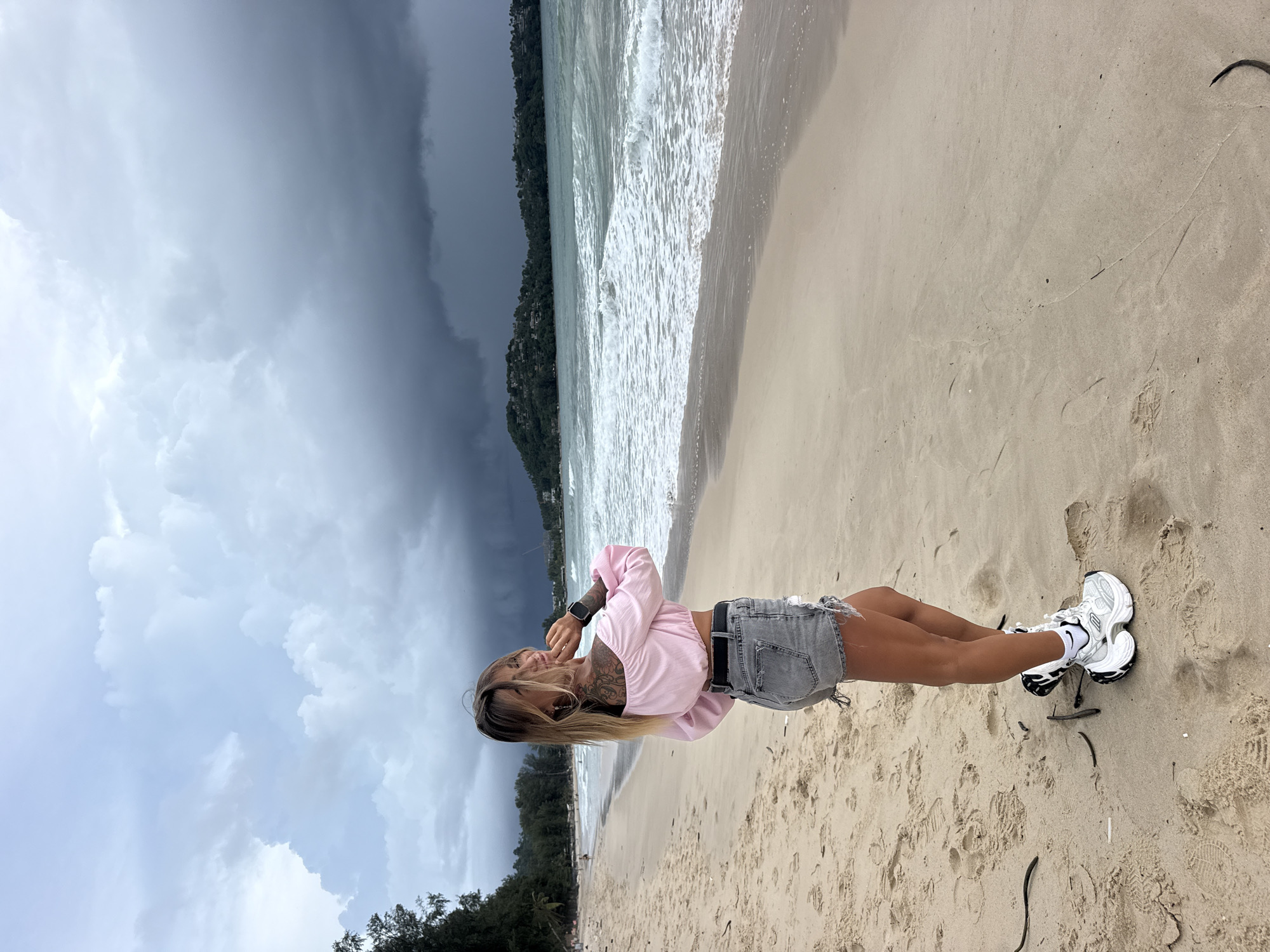 Overcast morning at Choeng Thale beach, swings and storm clouds