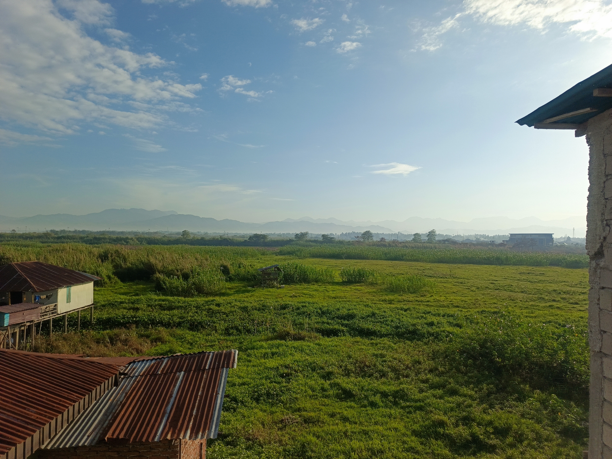 Rural hillside housing and landscape in Gorontalo, Indonesia