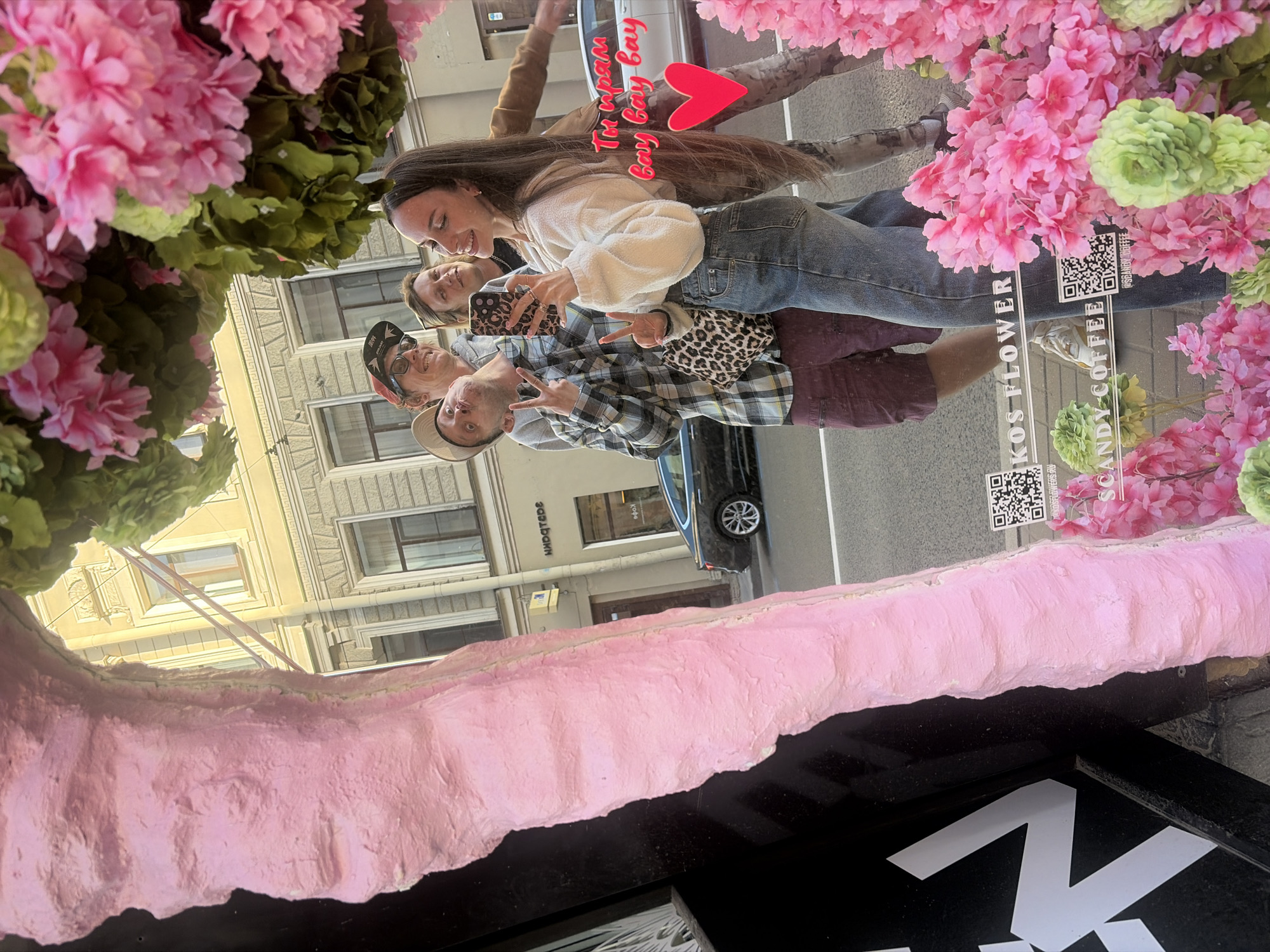 Tourist takes selfies around Saint Petersburg canals and shops