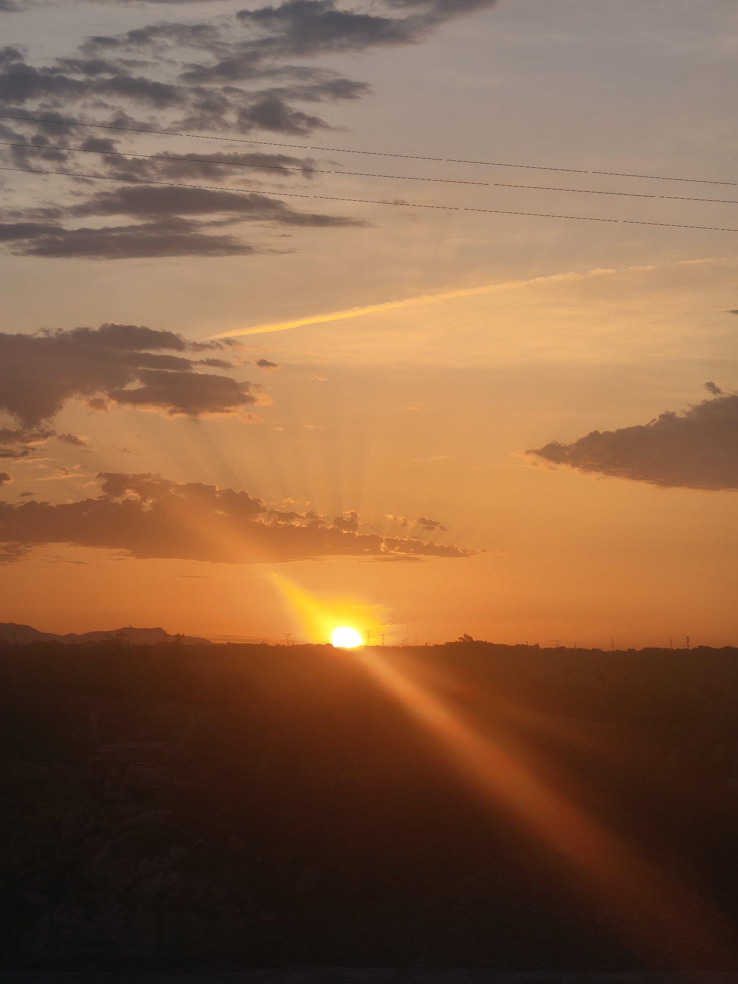 Sunset over rural industrial landscape in Riba-roja de Túria