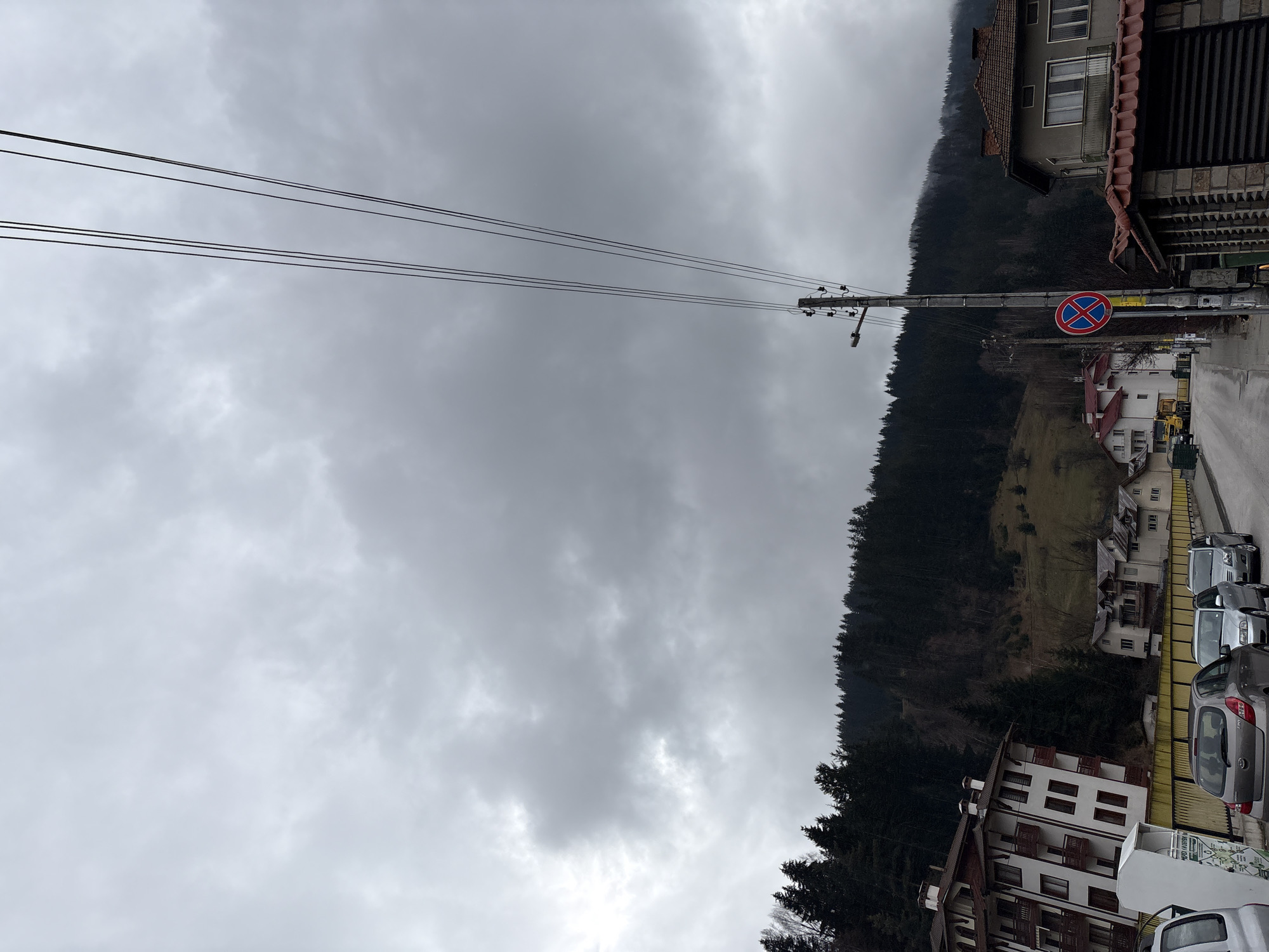 Cloudy day residential street scene in Chepelare, Bulgaria