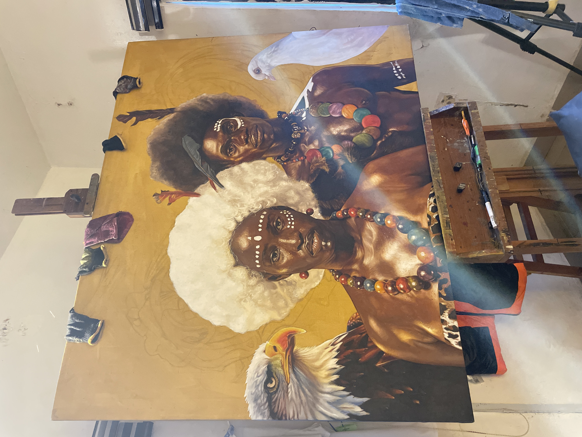 Inside a Nigerian art studio full of traditional portrait paintings