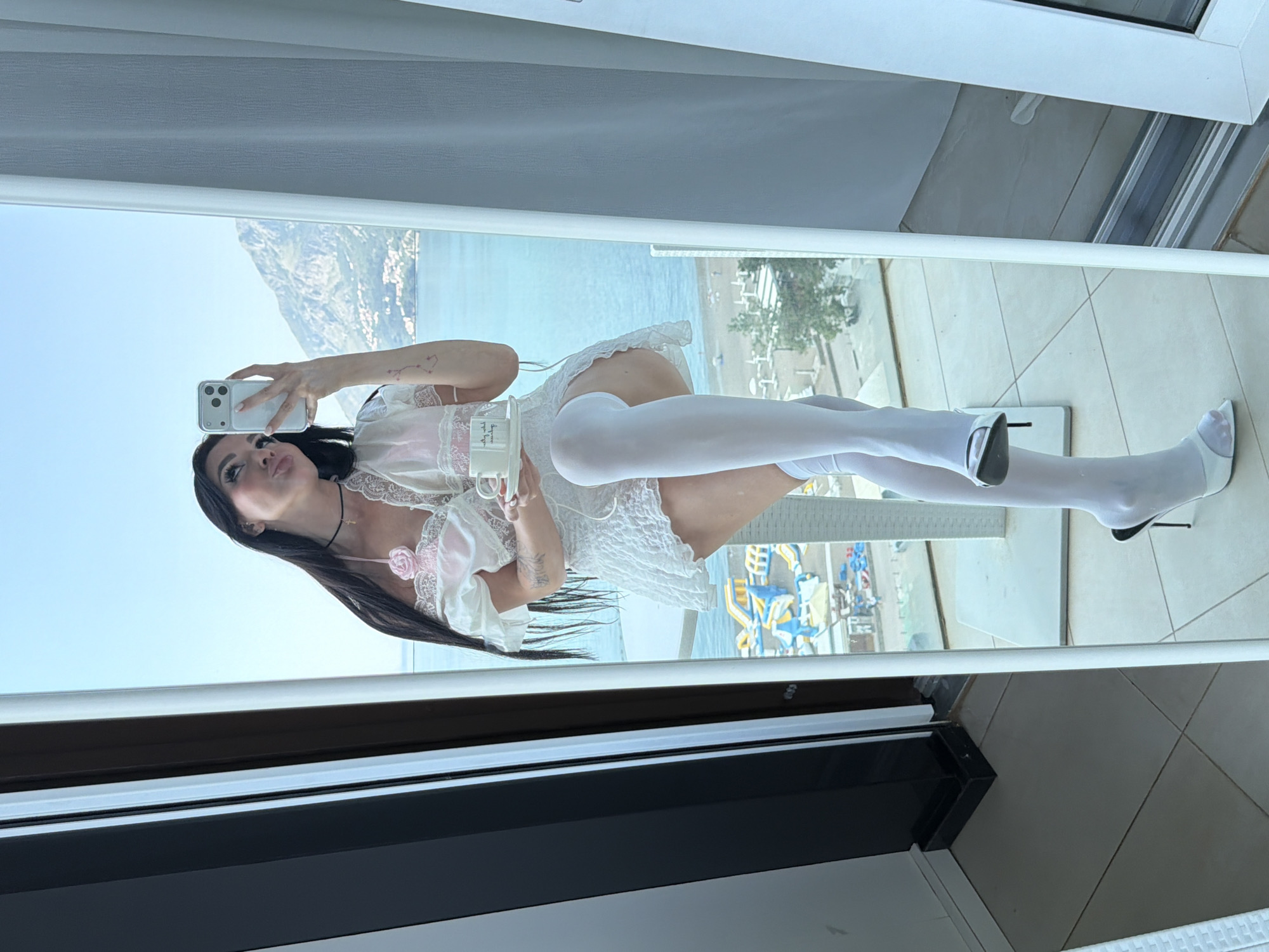 Woman Takes Selfies During Coffee Break in Boreti Montenegro