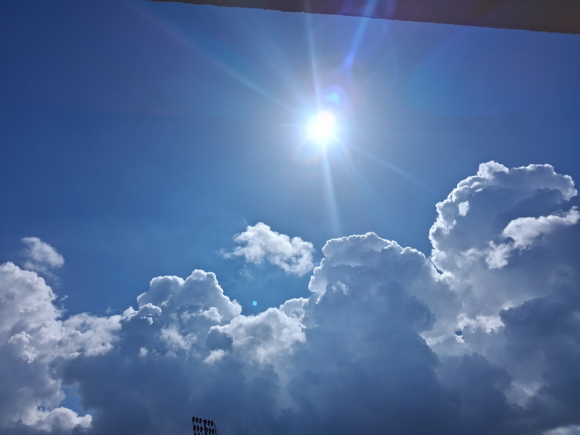 Bright sunny skies with cumulus clouds observed in Portugal