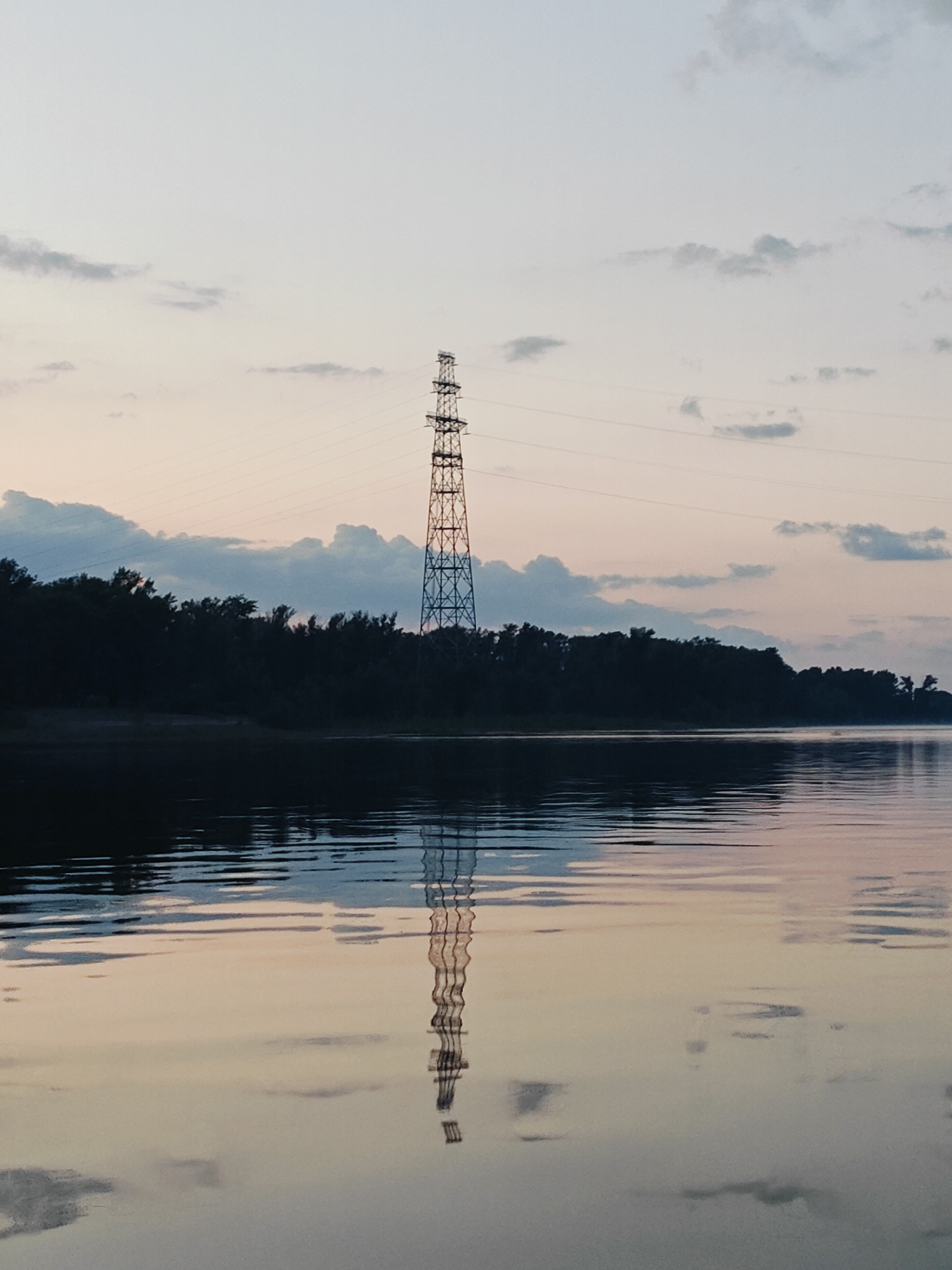 Evening on the water near Ol'khovskoye, pylons and boats