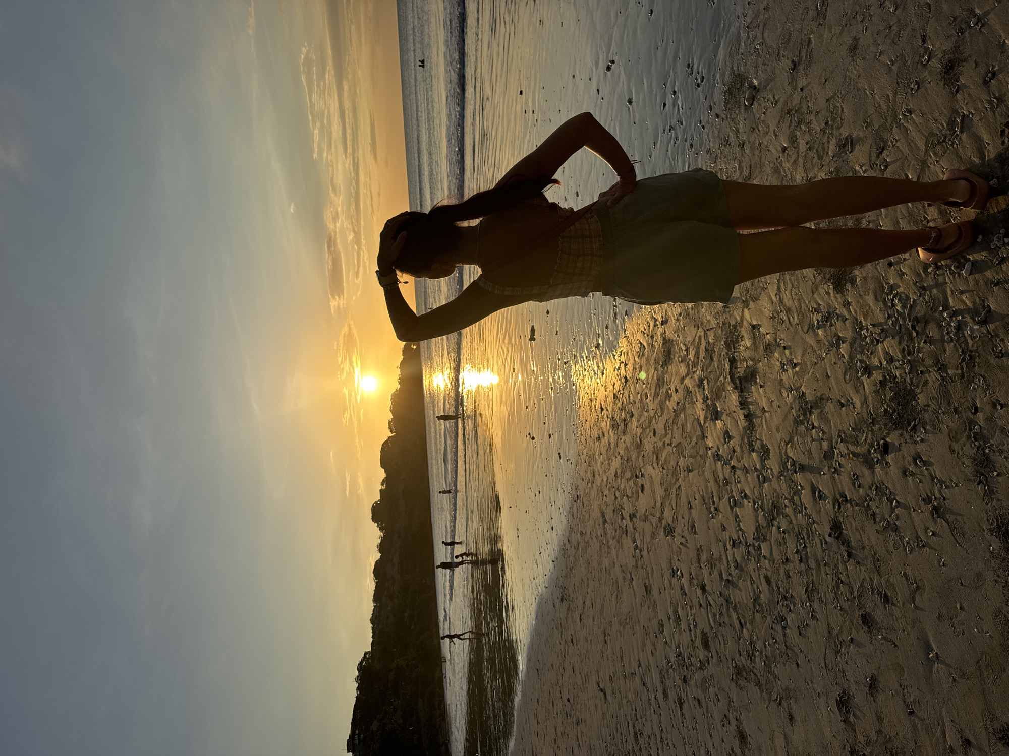 Evening beach life captured in Kuta Selatan sunset scenes