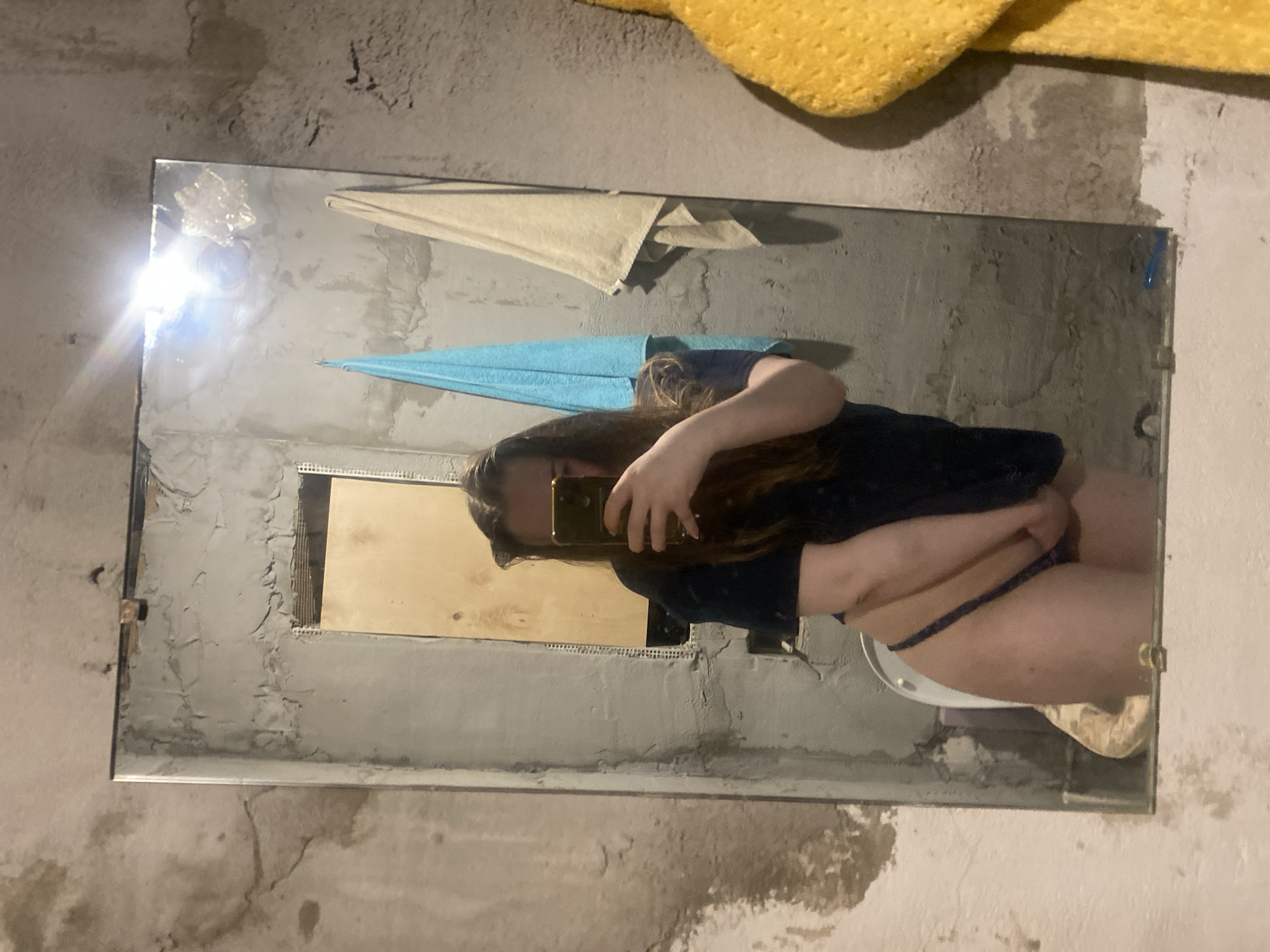 Selfie session in an unfinished bathroom, various angles