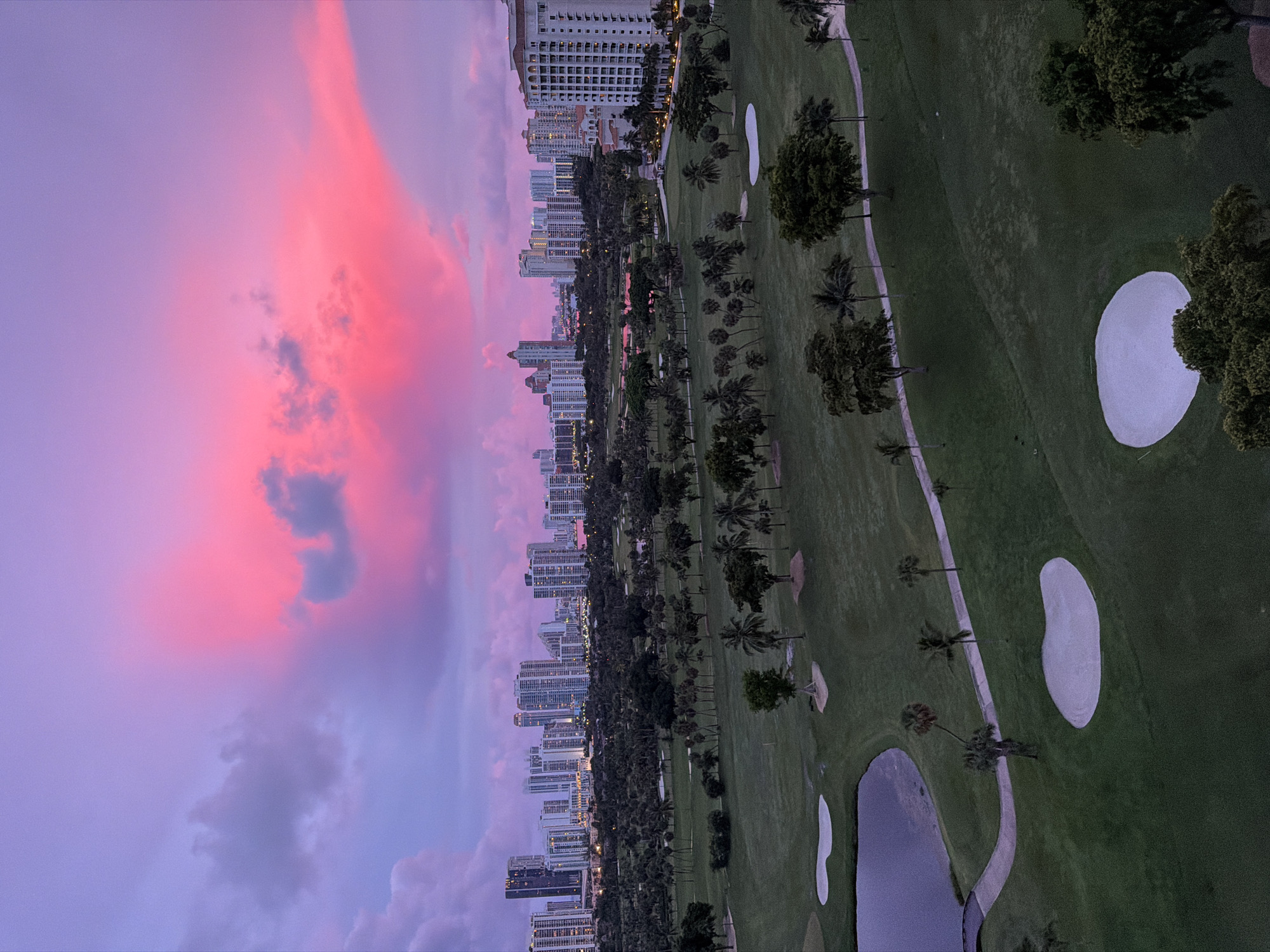 Pink and purple sunset colors the Aventura sky