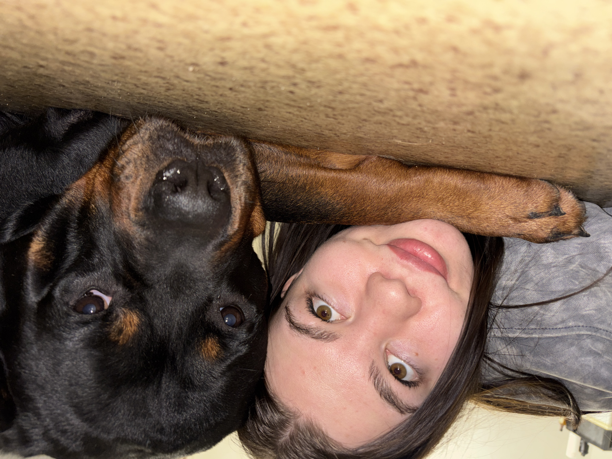 Woman's afternoon moments captured with dog and elevator selfie