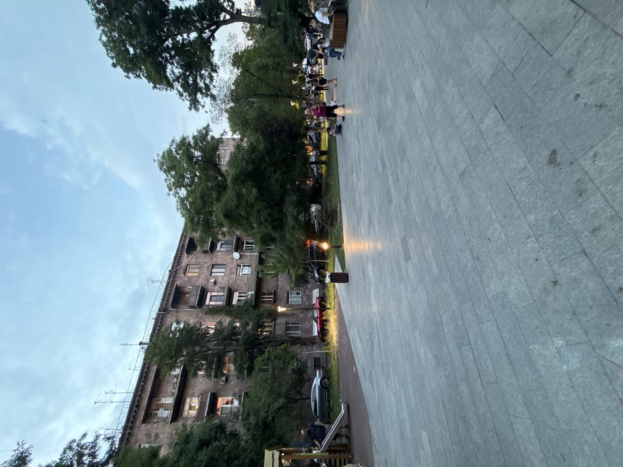 Afternoon at a Yerevan park plaza with fountains and locals