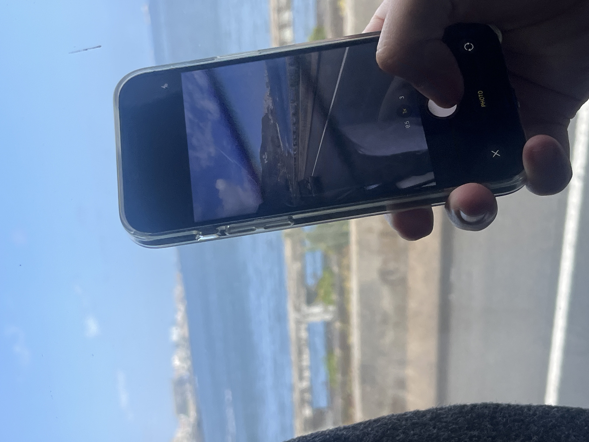 Person captures photo with smartphone in Telde, Spain