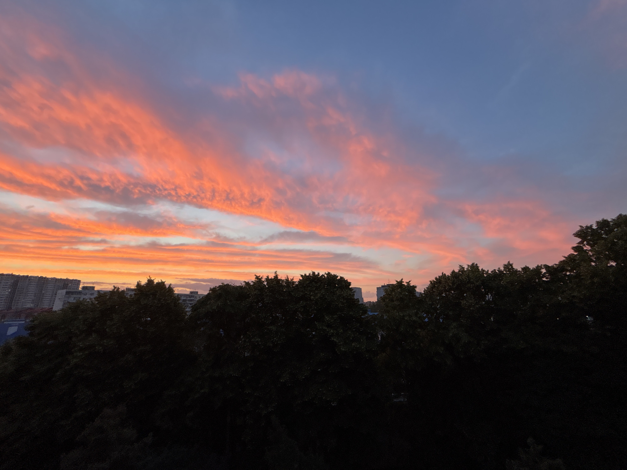 Krasnodar skyline glows under a dramatic summer sunset