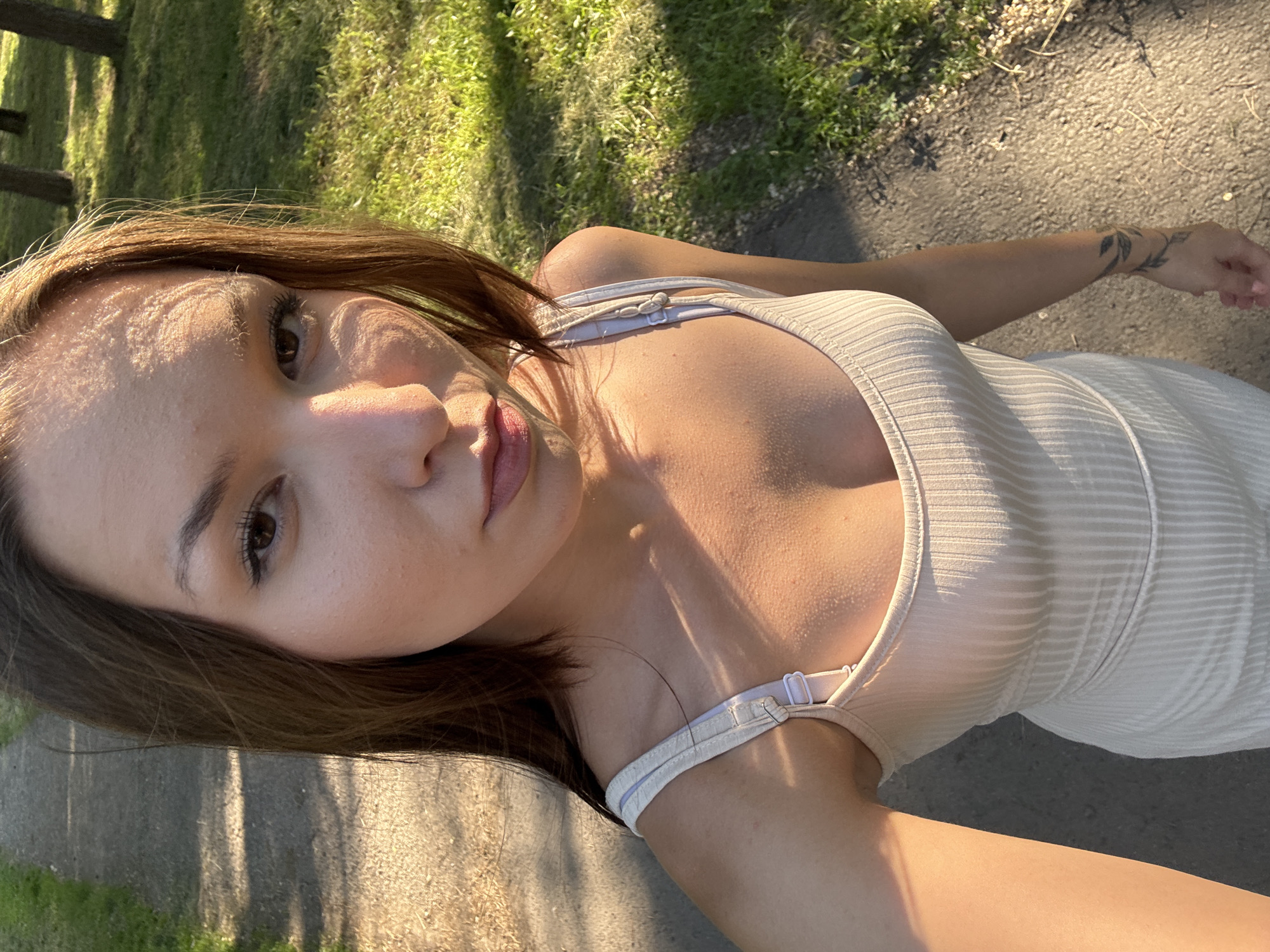 Casual outdoor self-portraits on a gravel path in Inskoy