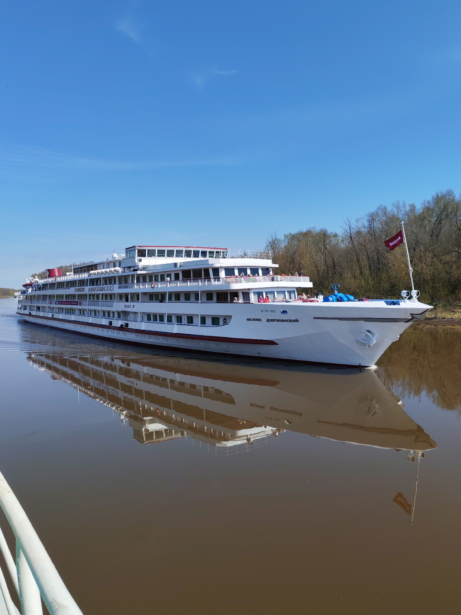 River cruise ships navigate Yakhroma waterway during morning hours