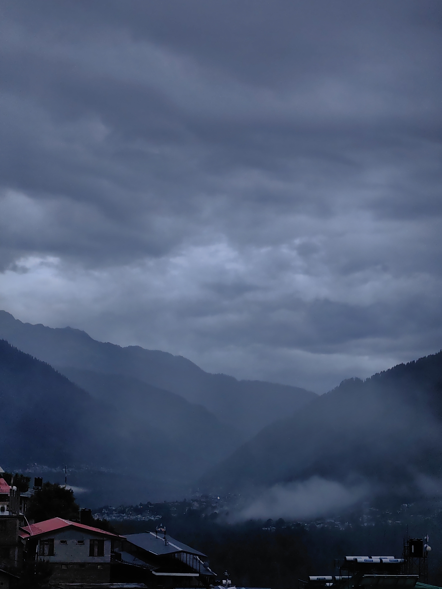 Vashisht at dusk: hot springs, temple carvings, and Himalayan cloud
