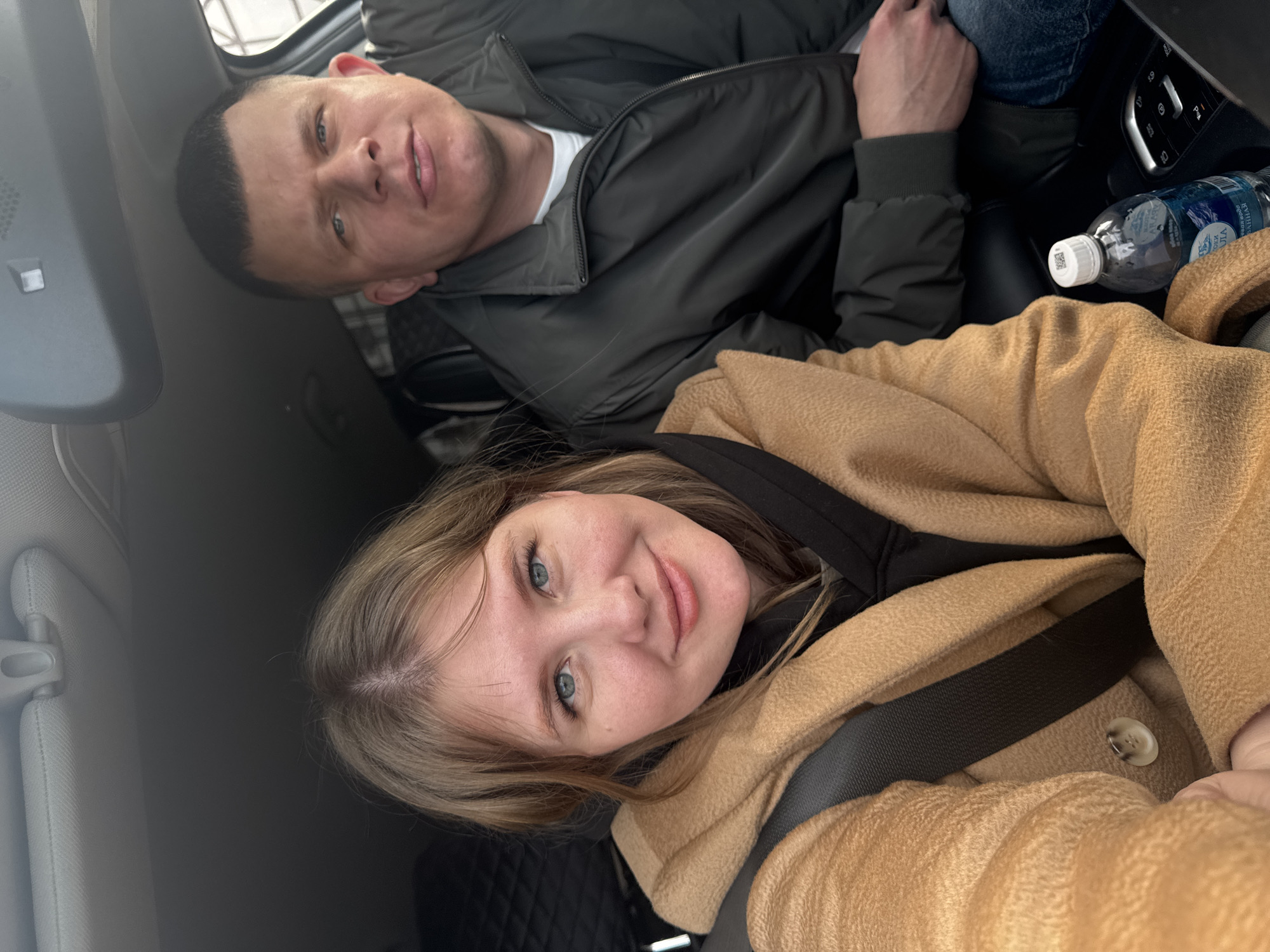 Two people take daytime car selfie in Russia