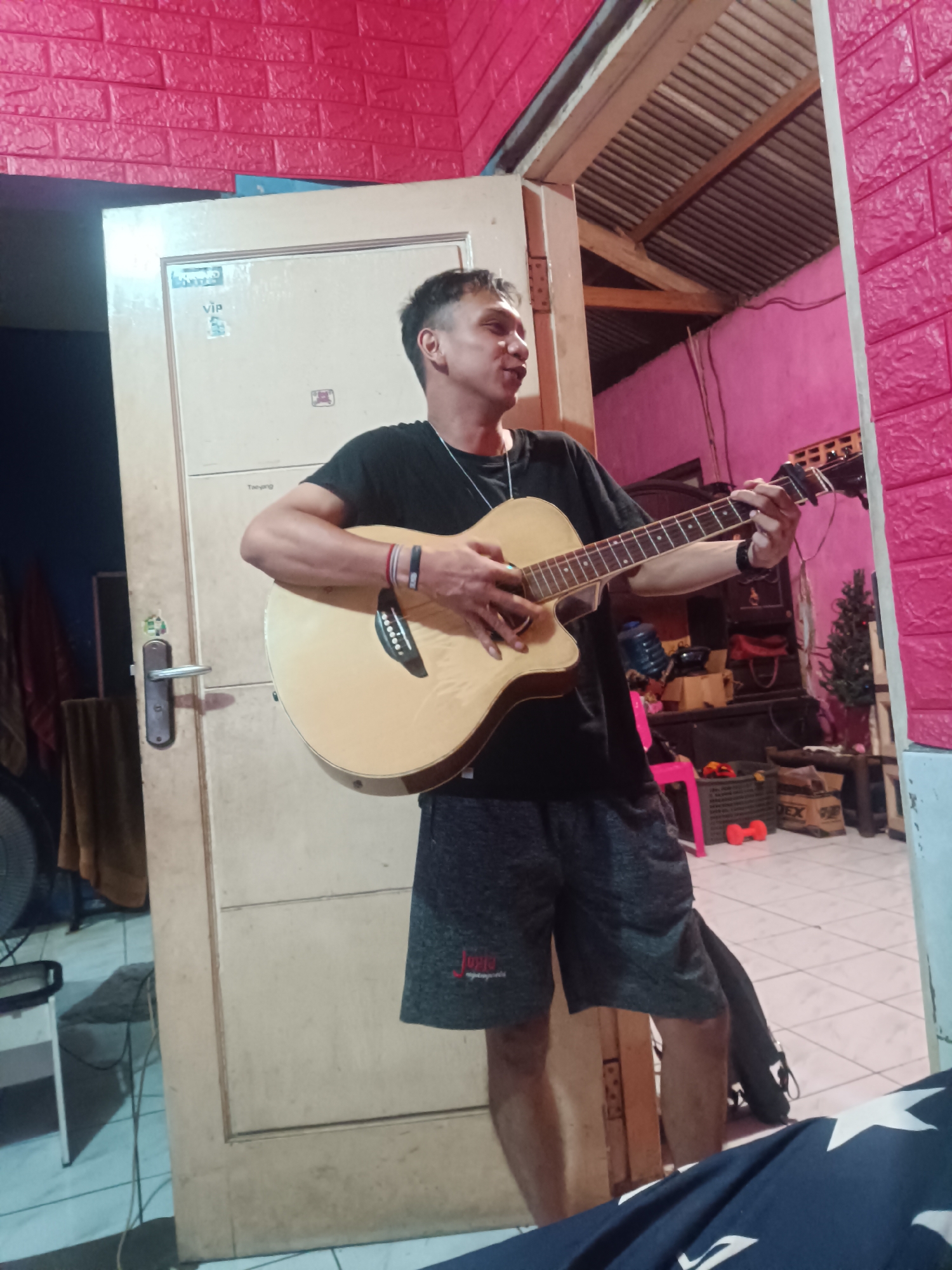 Informal music session captured in Depok bedroom performance