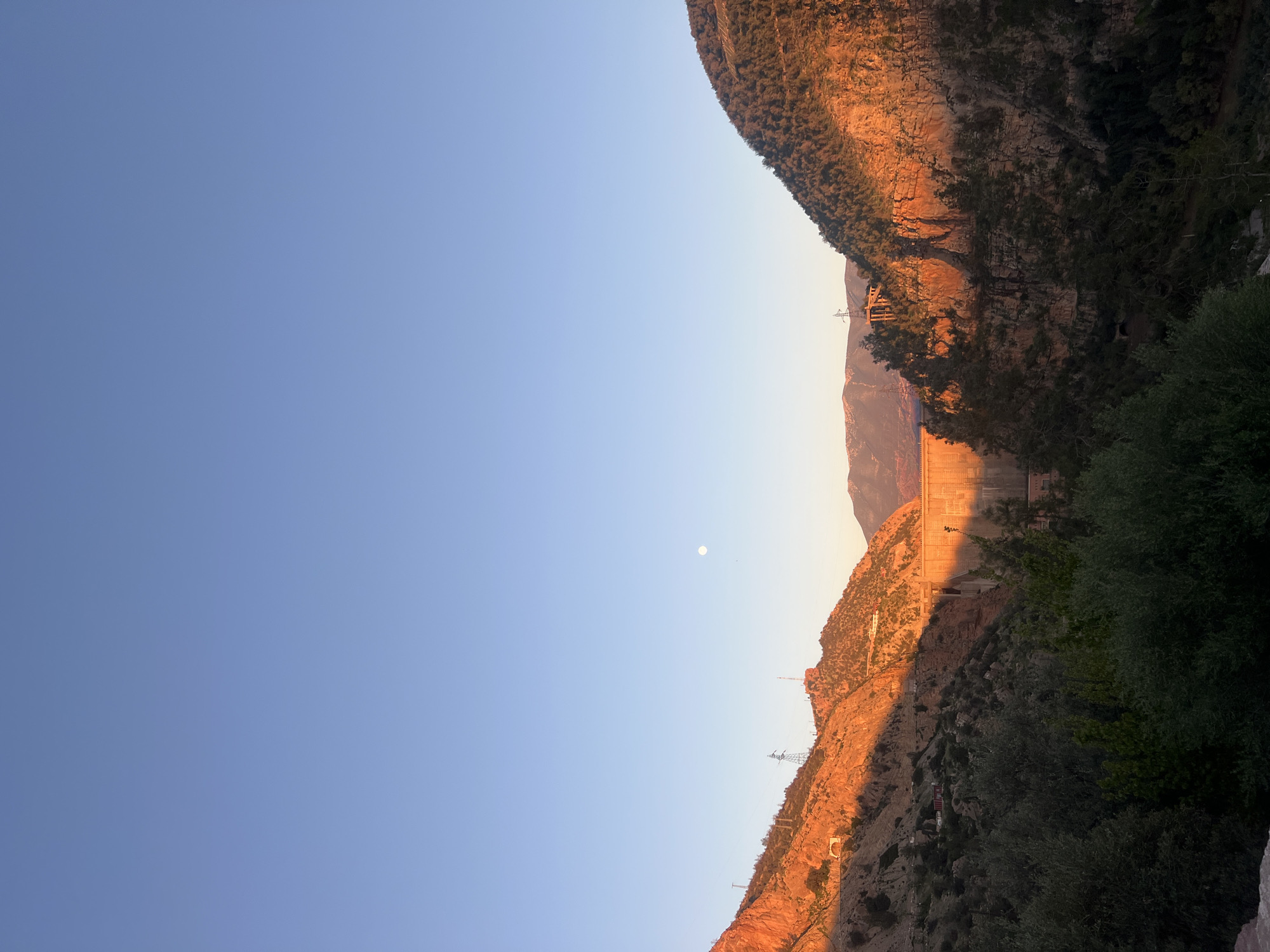 Full moon rises over Bin El Ouidane dam, Morocco