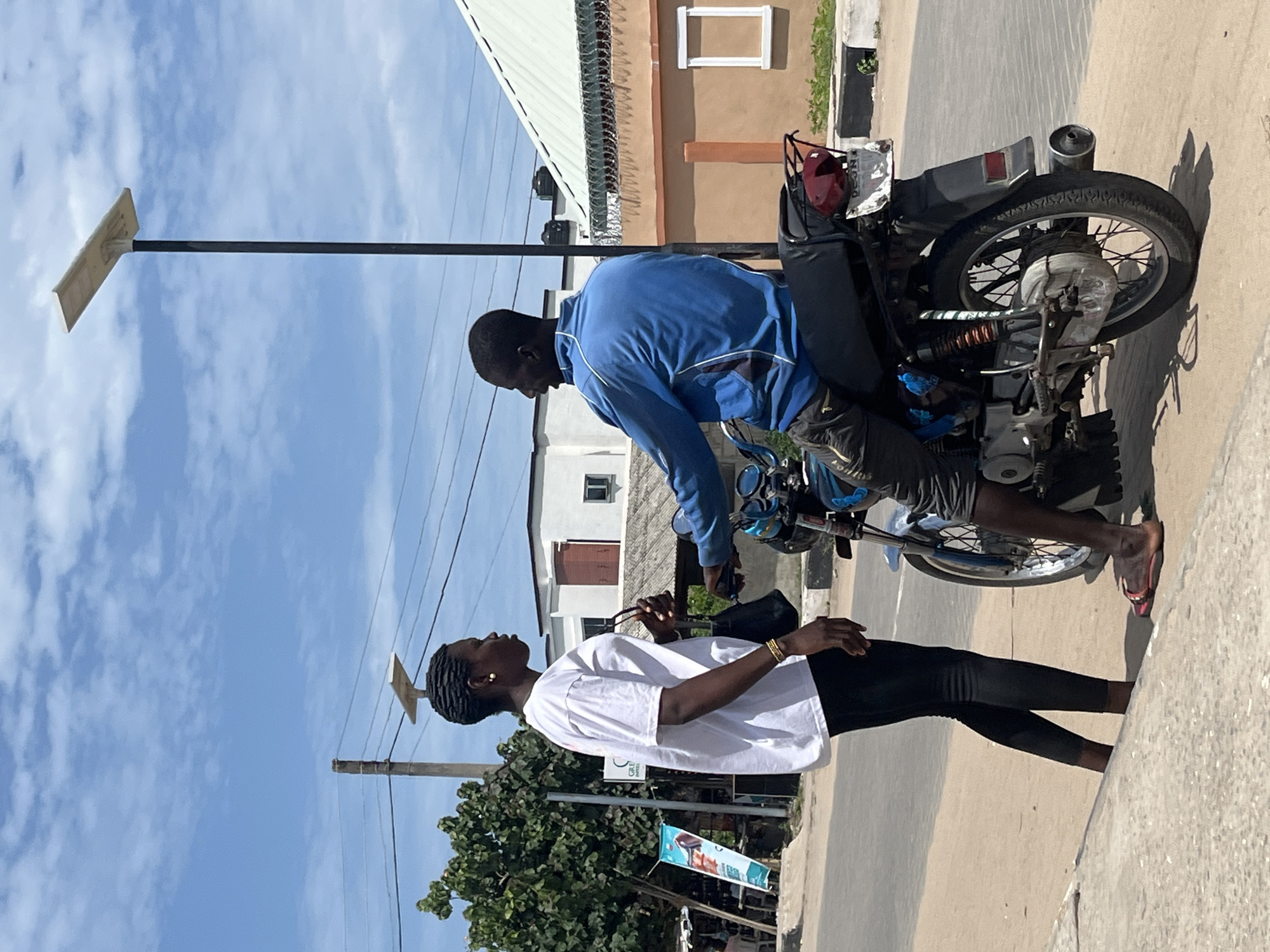 Motorcycle pickup captured on Badagry street
