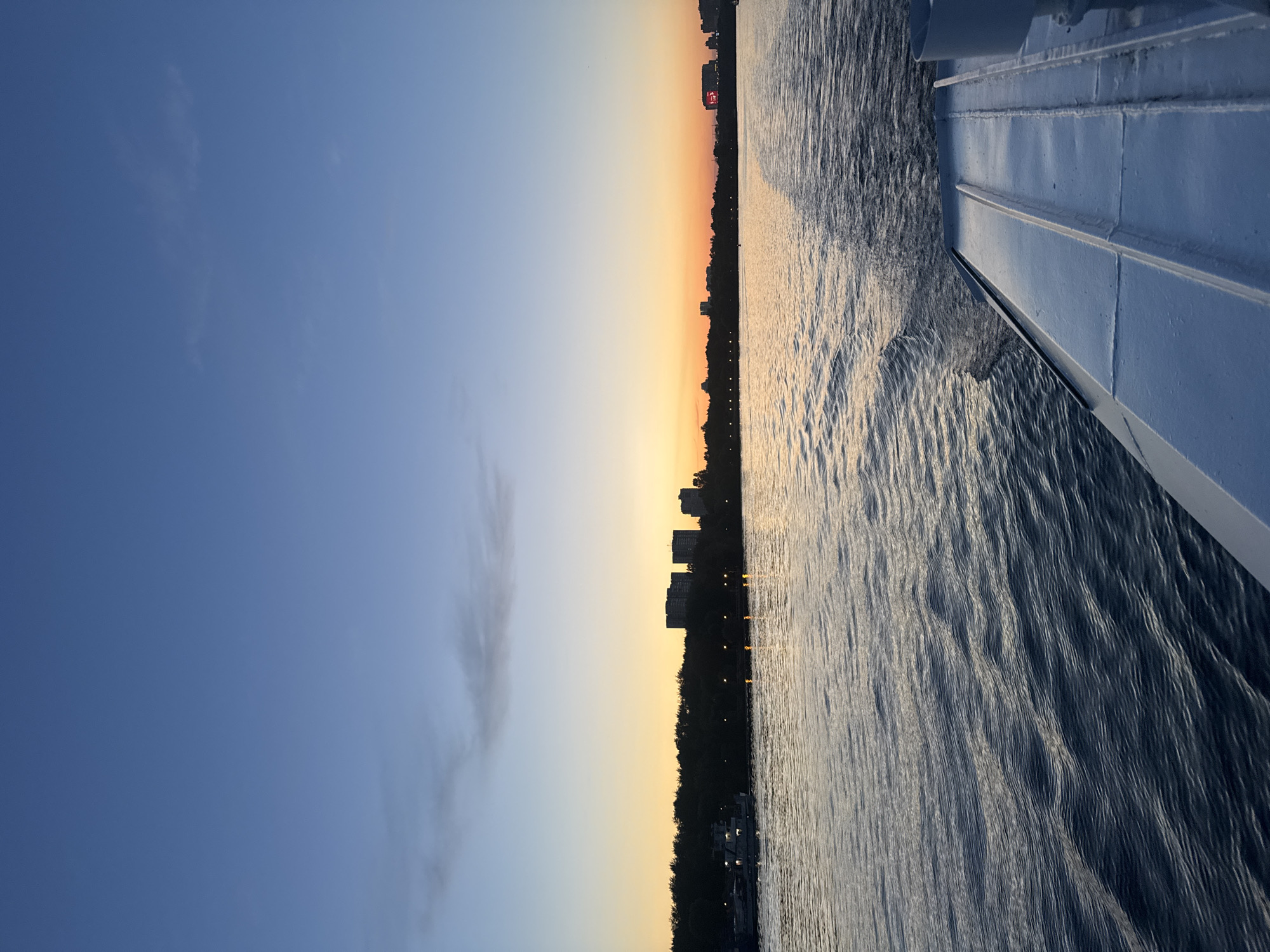Dusk on the Moskva River, Khimki skyline at golden hour