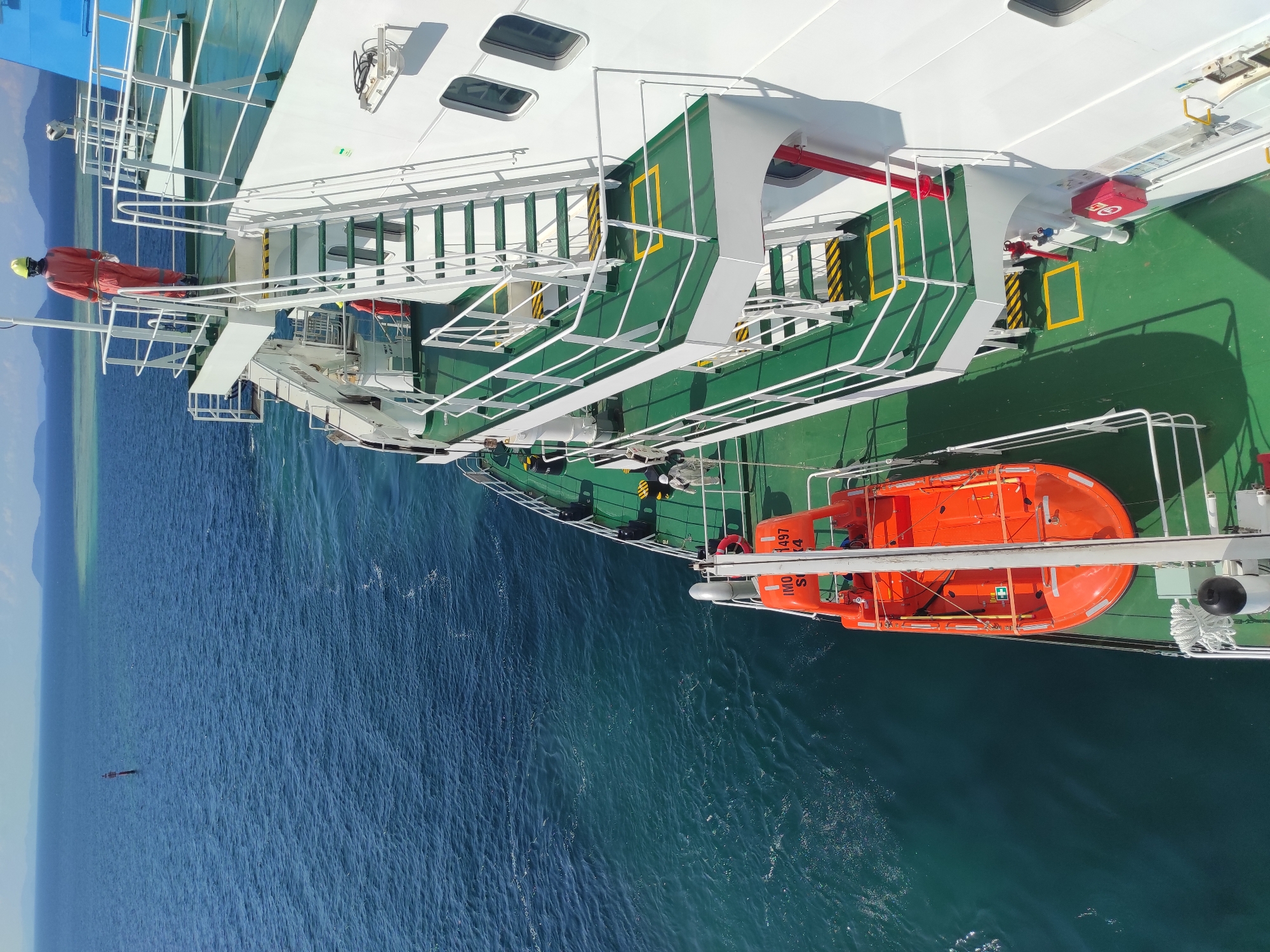 Large vessel docks at industrial pier in Kunak, Malaysia