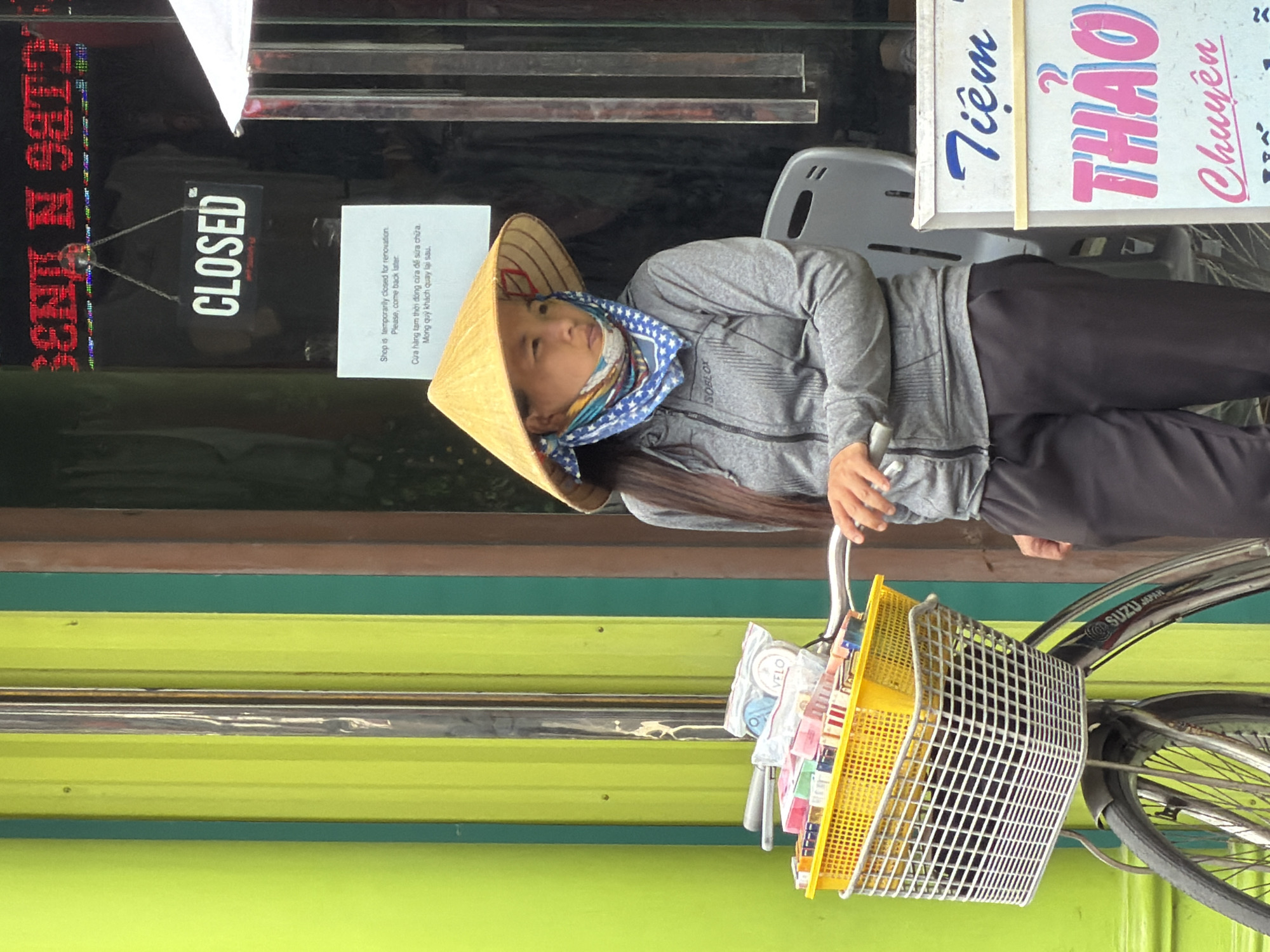 Nha Trang street scene: vendors, riders, and tourists mid-morning